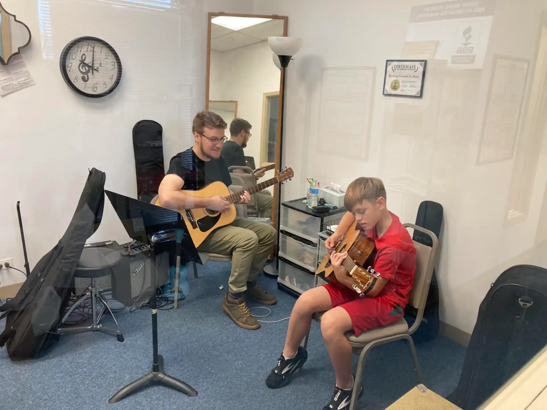 a couple of men playing instruments