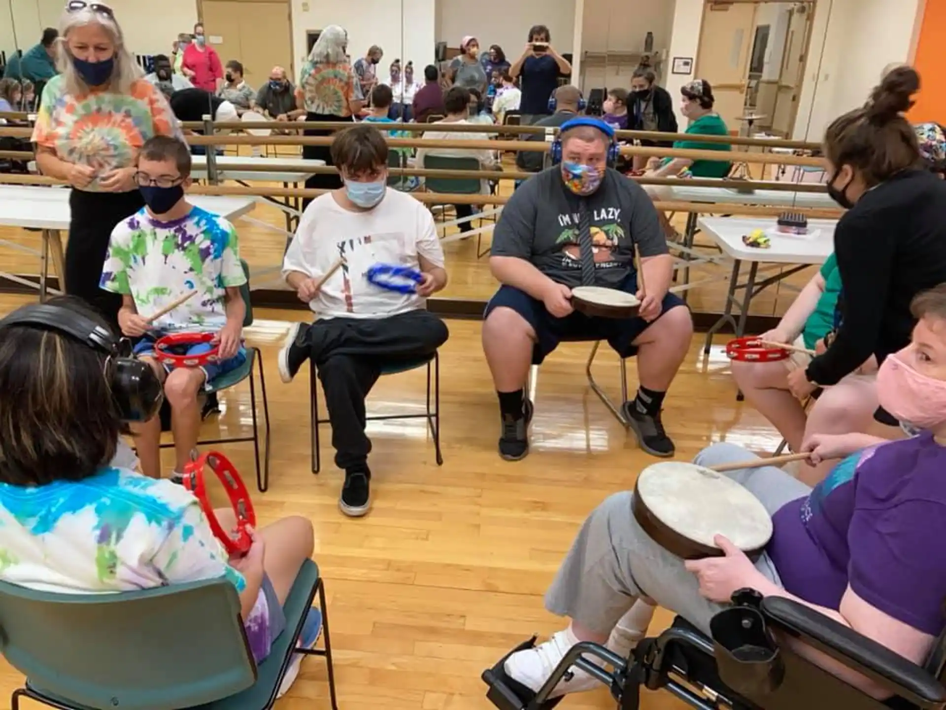 a group of people sitting in chairs