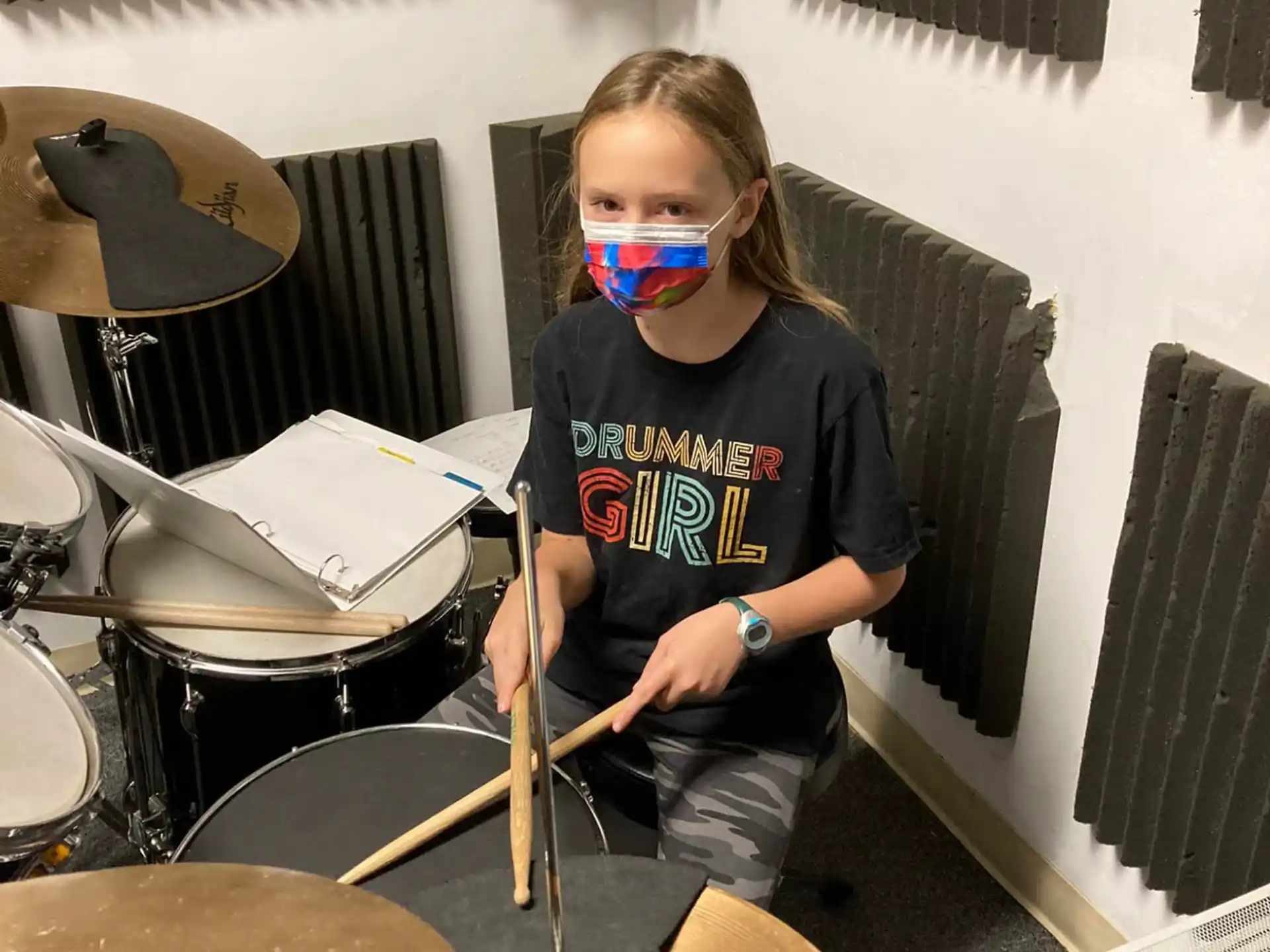 a person playing drums