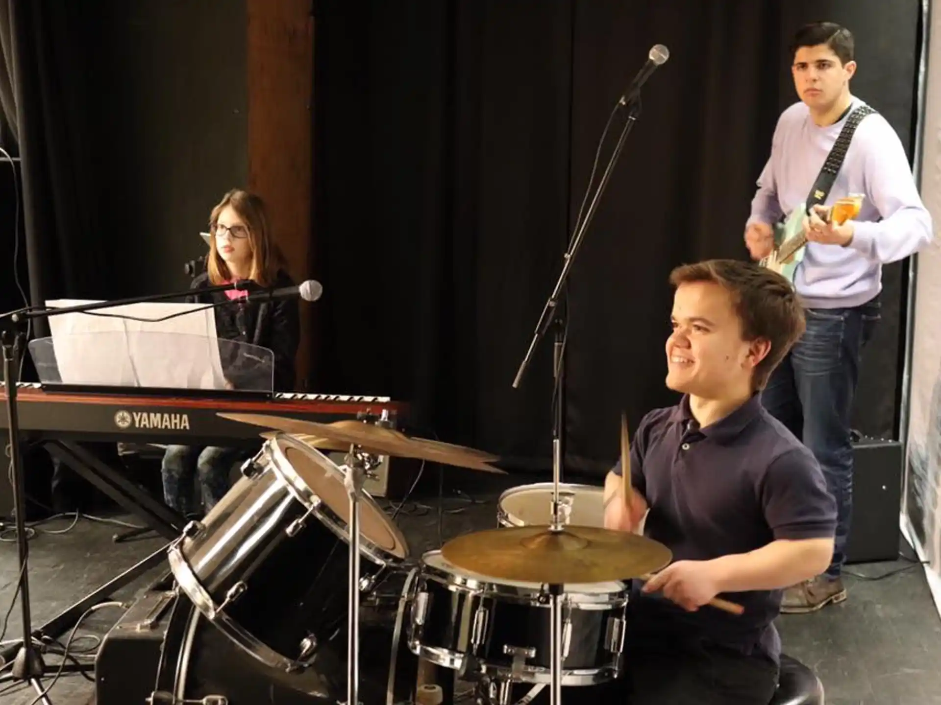 a group of people playing instruments