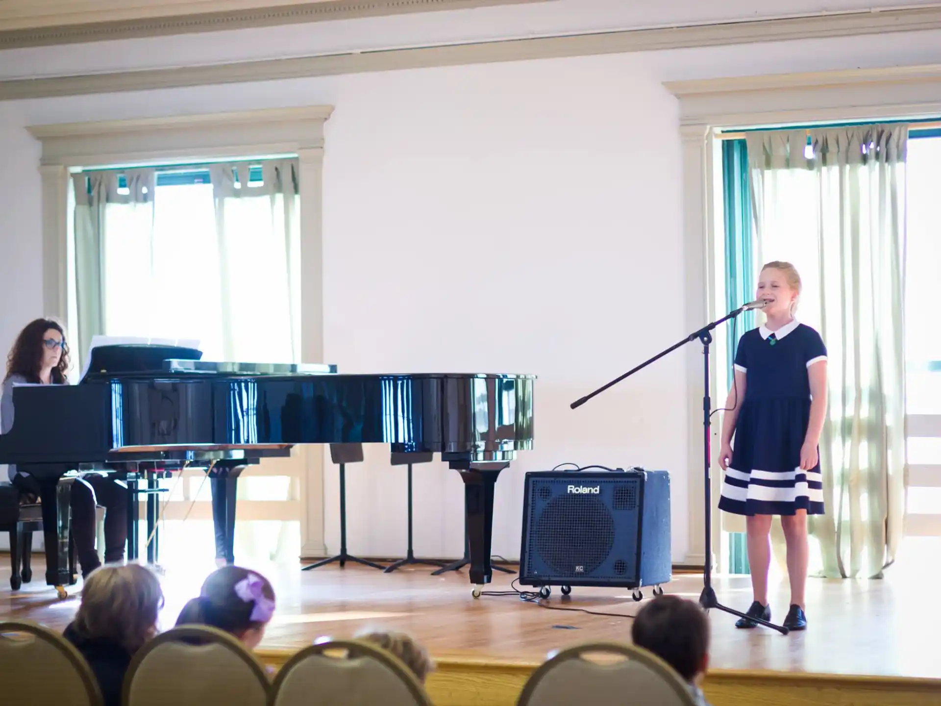 a man and woman on a stage