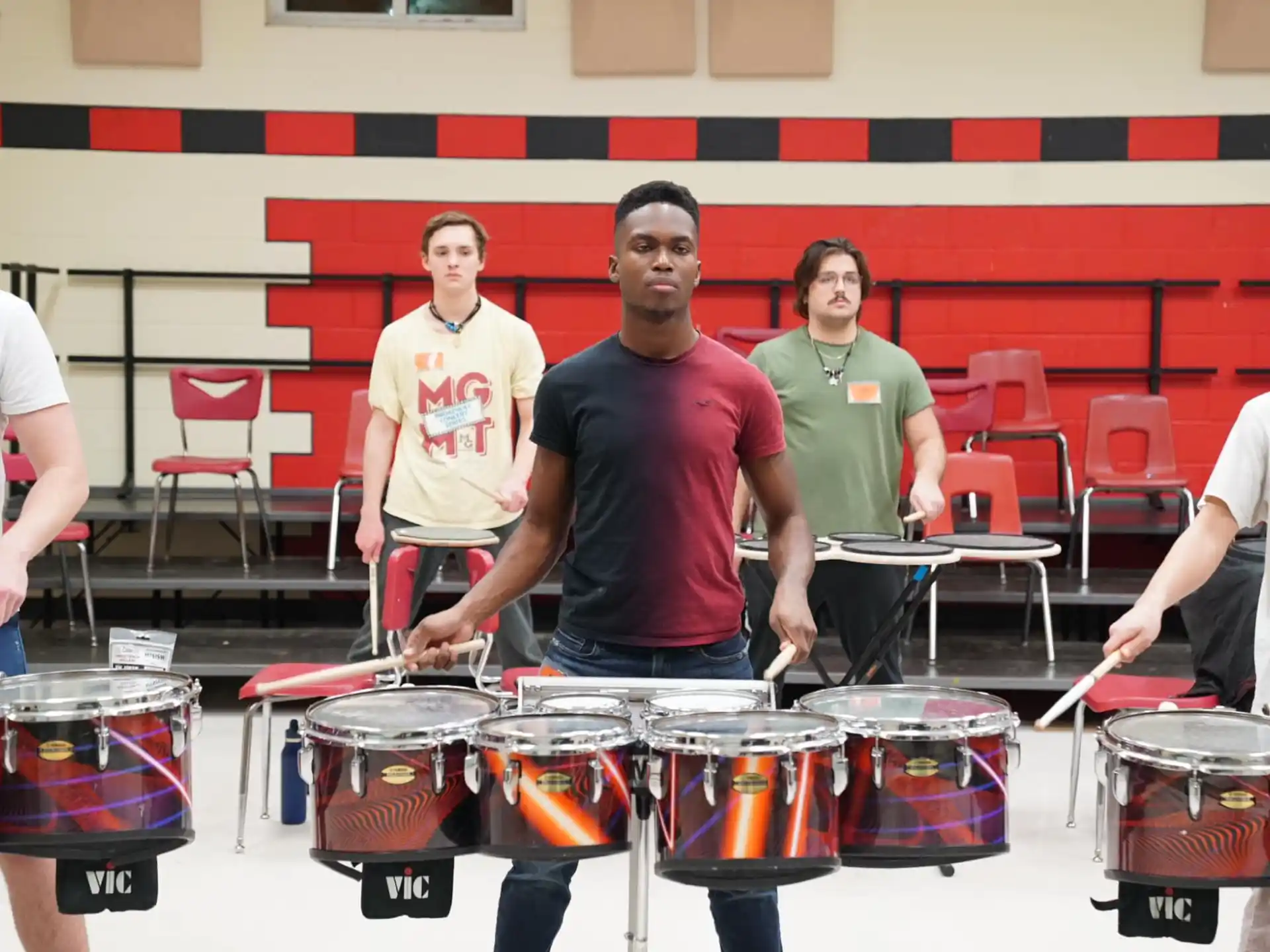 a group of people playing drums