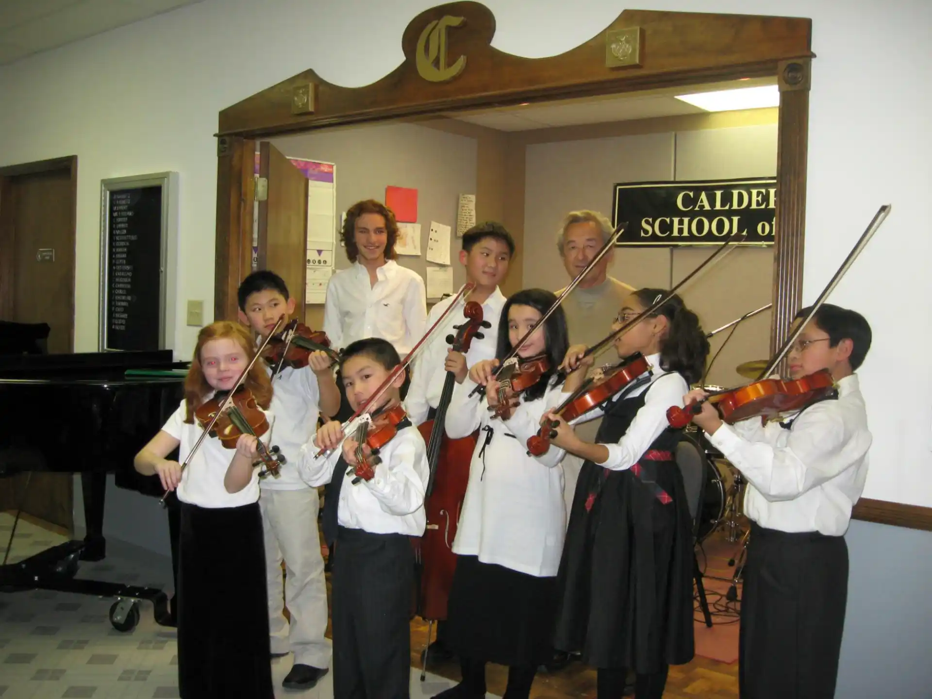 a group of people playing instruments