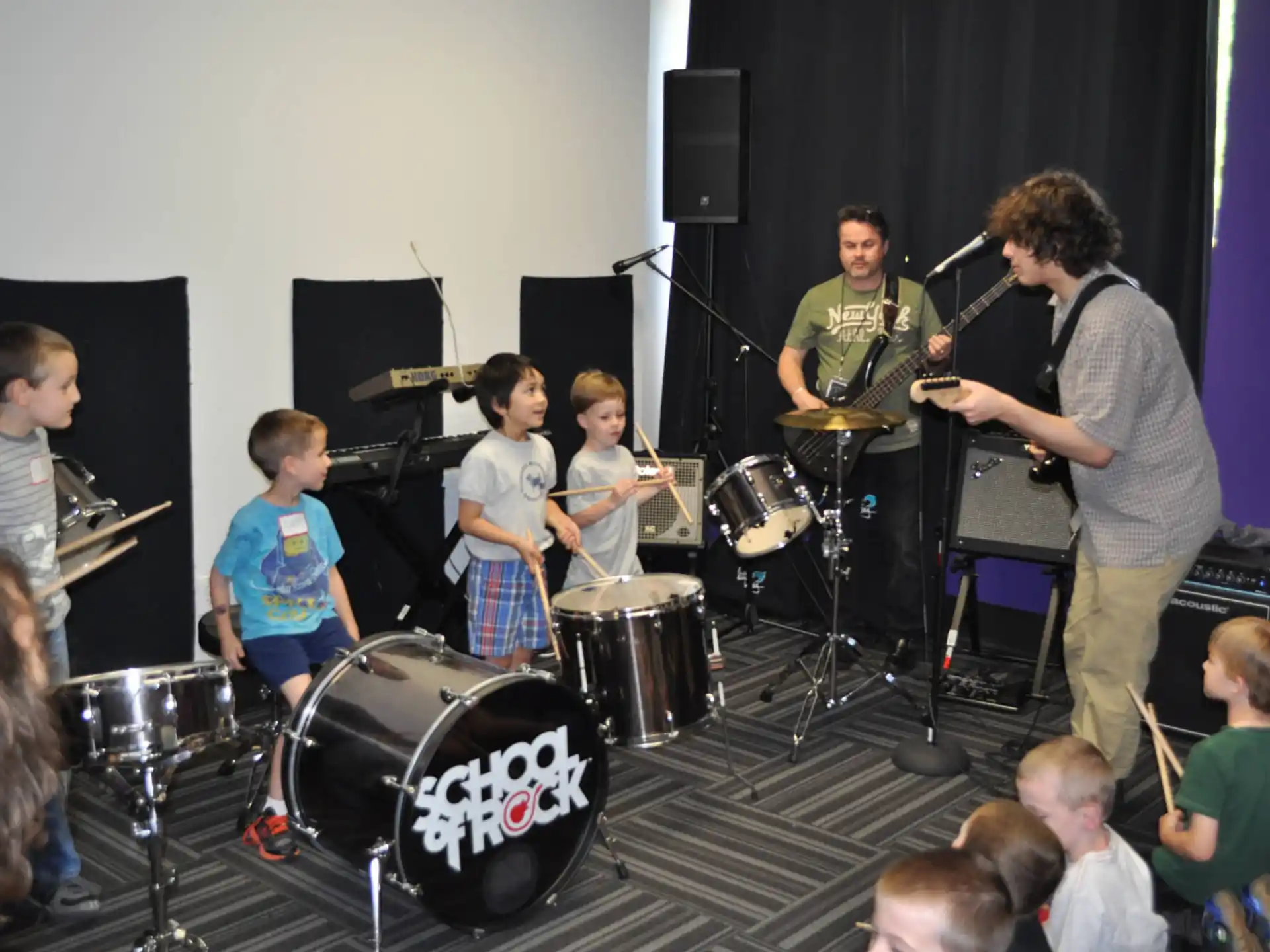 a group of people playing instruments