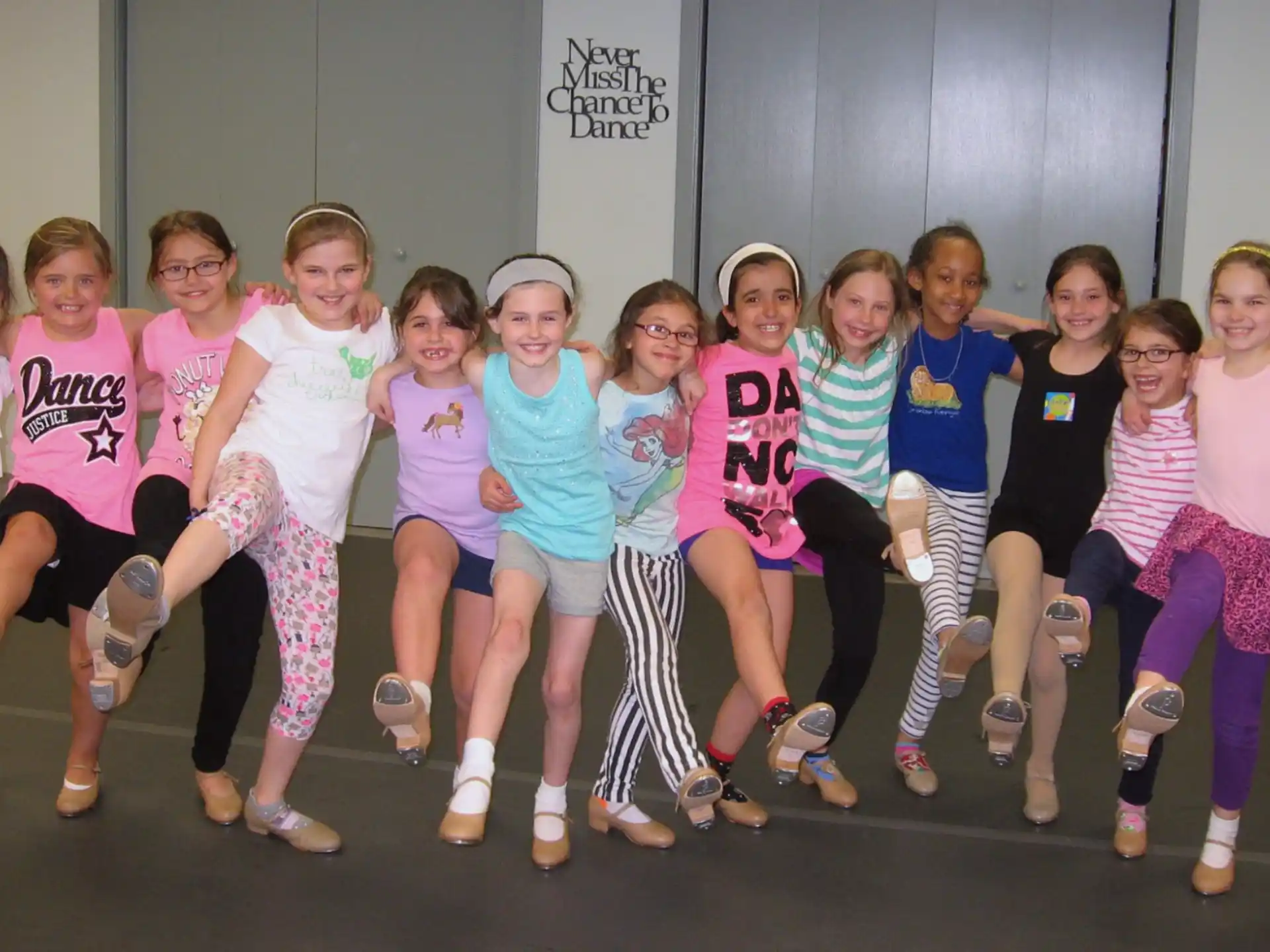 a group of girls posing for a photo