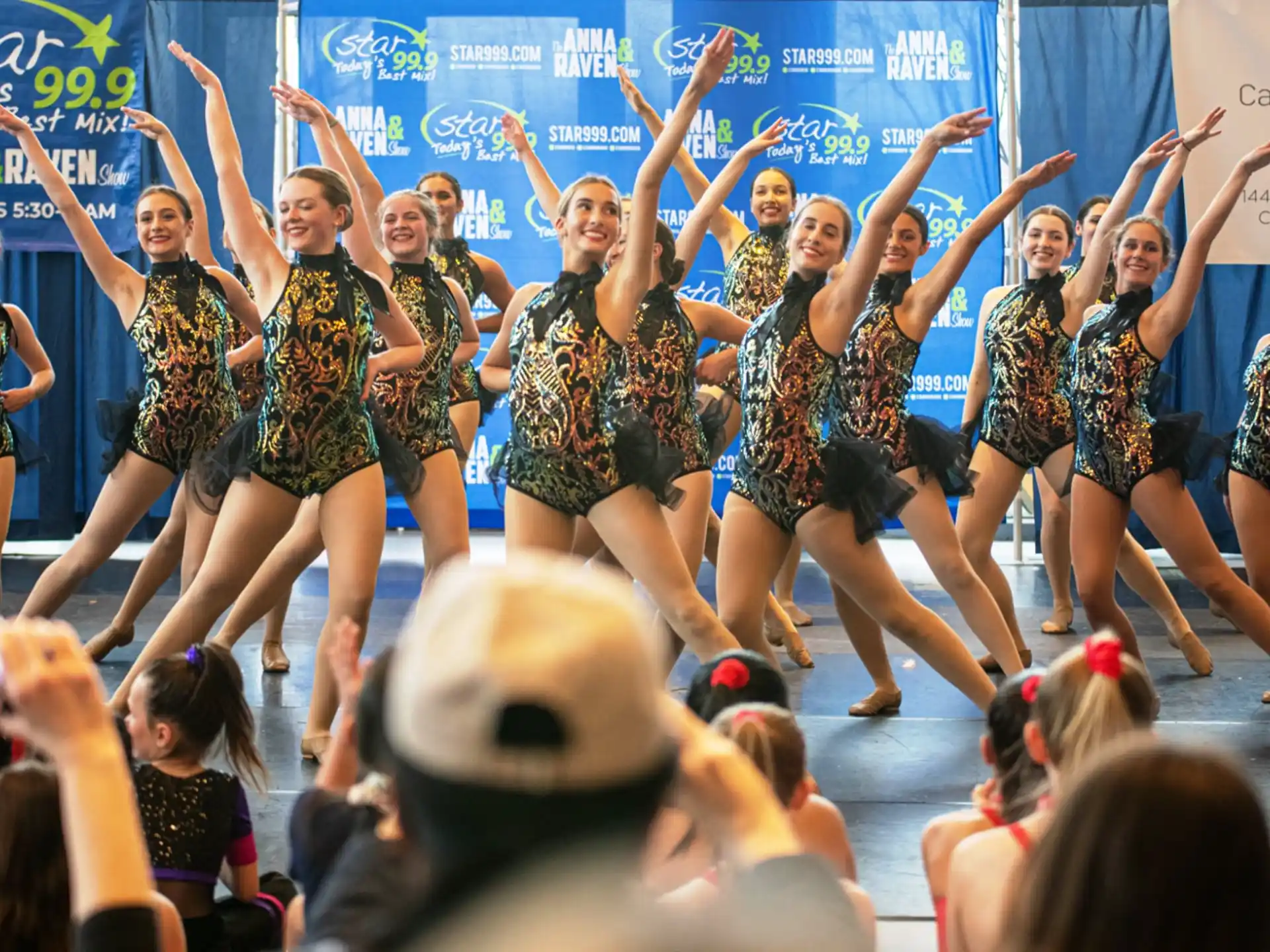 a group of women dancing on a stage
