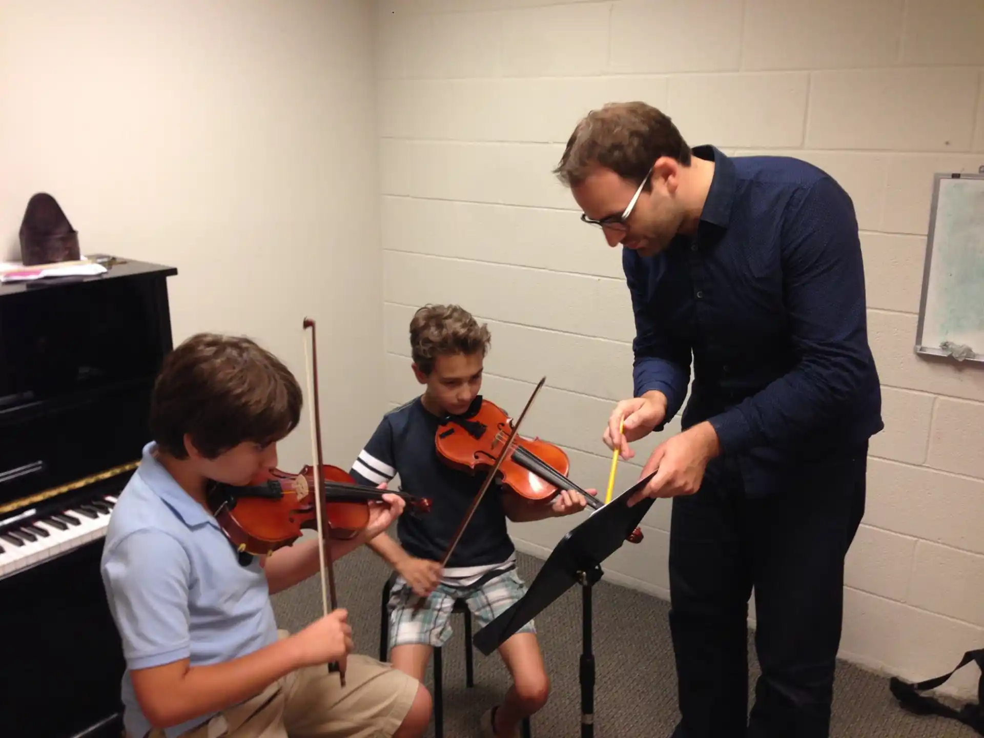 a group of people playing instruments