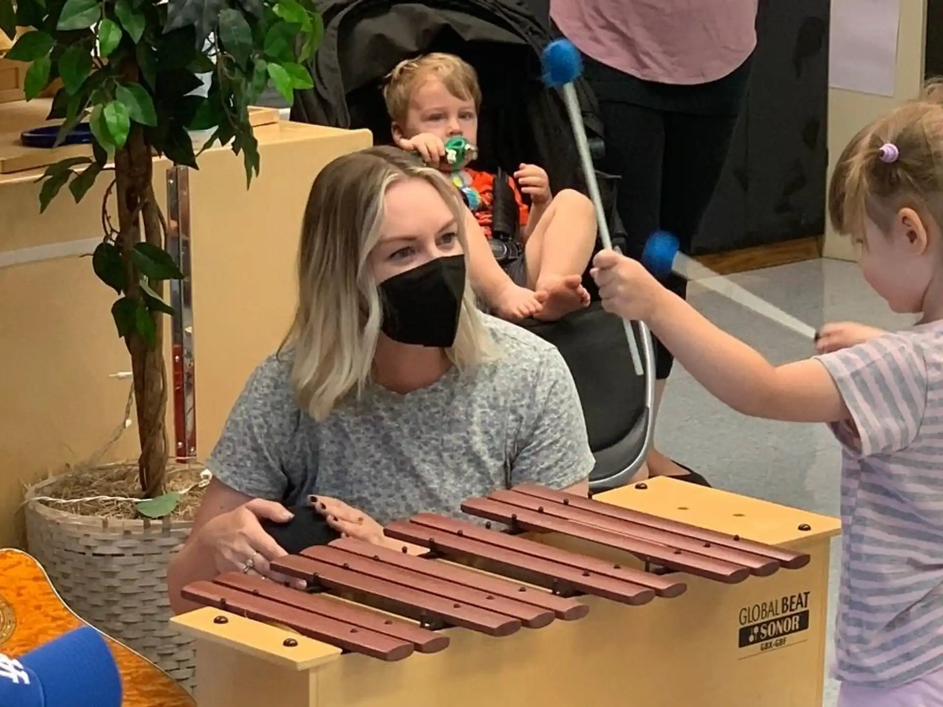 a group of children playing instruments