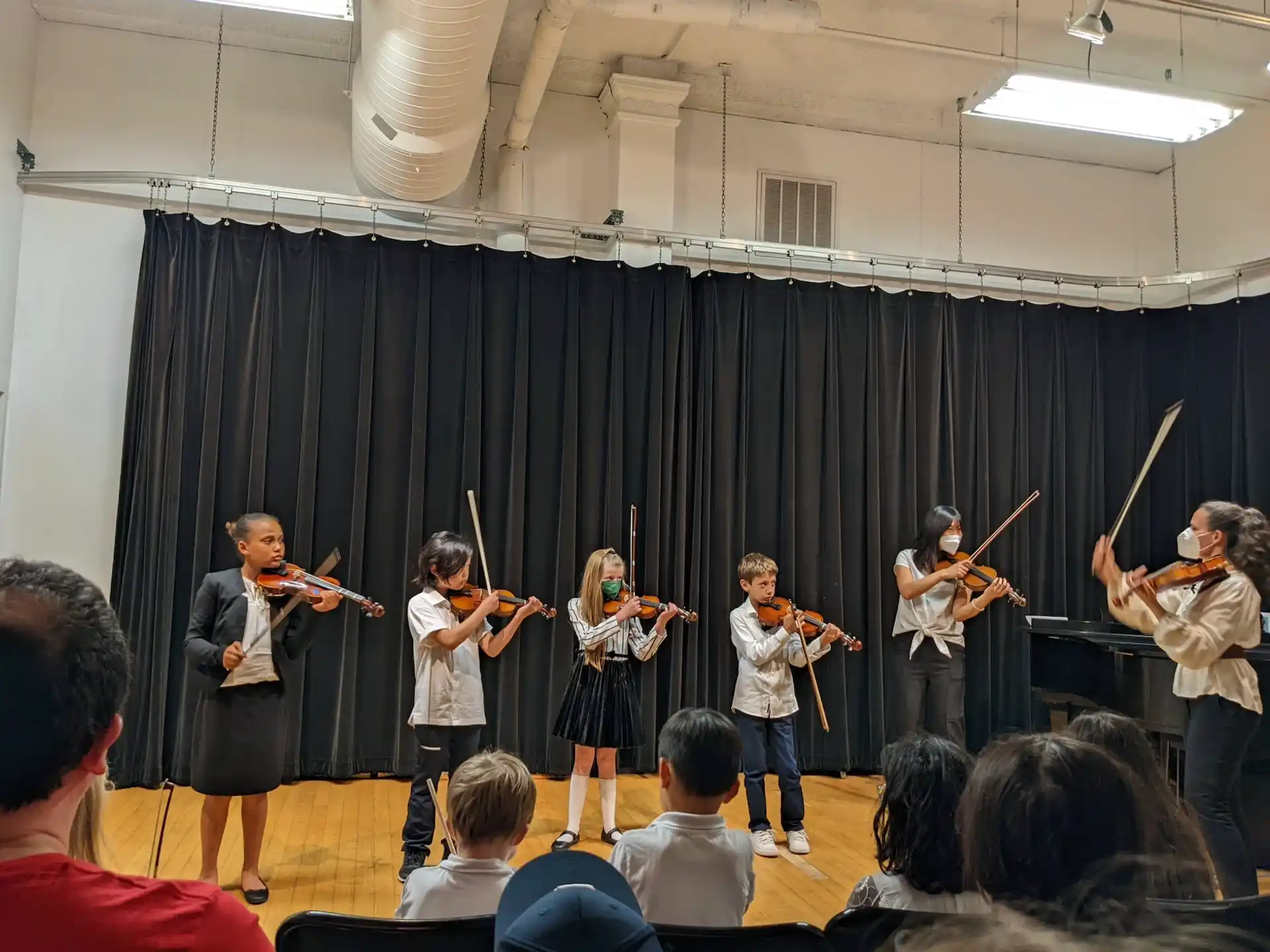 a group of people playing instruments