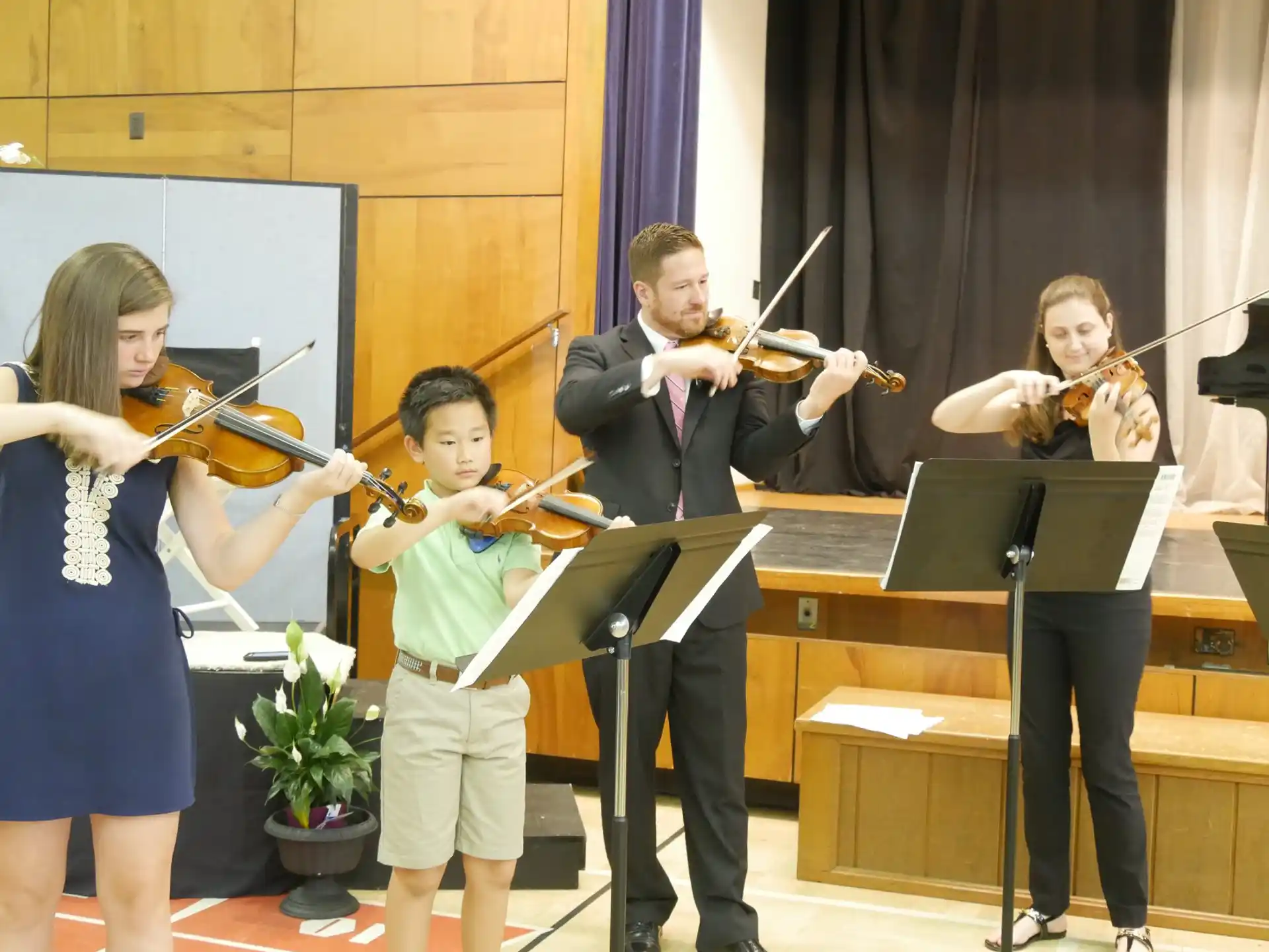 a group of people playing instruments