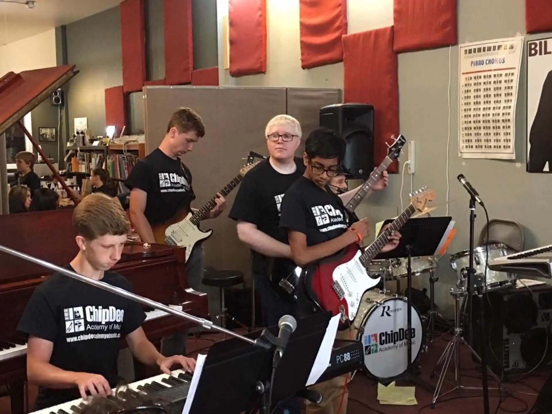 a group of people playing instruments