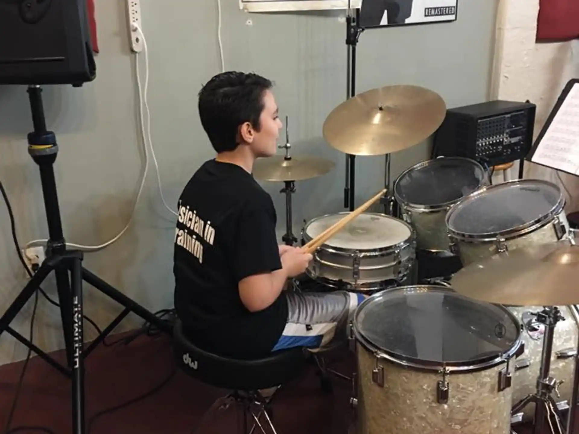 a person playing drums