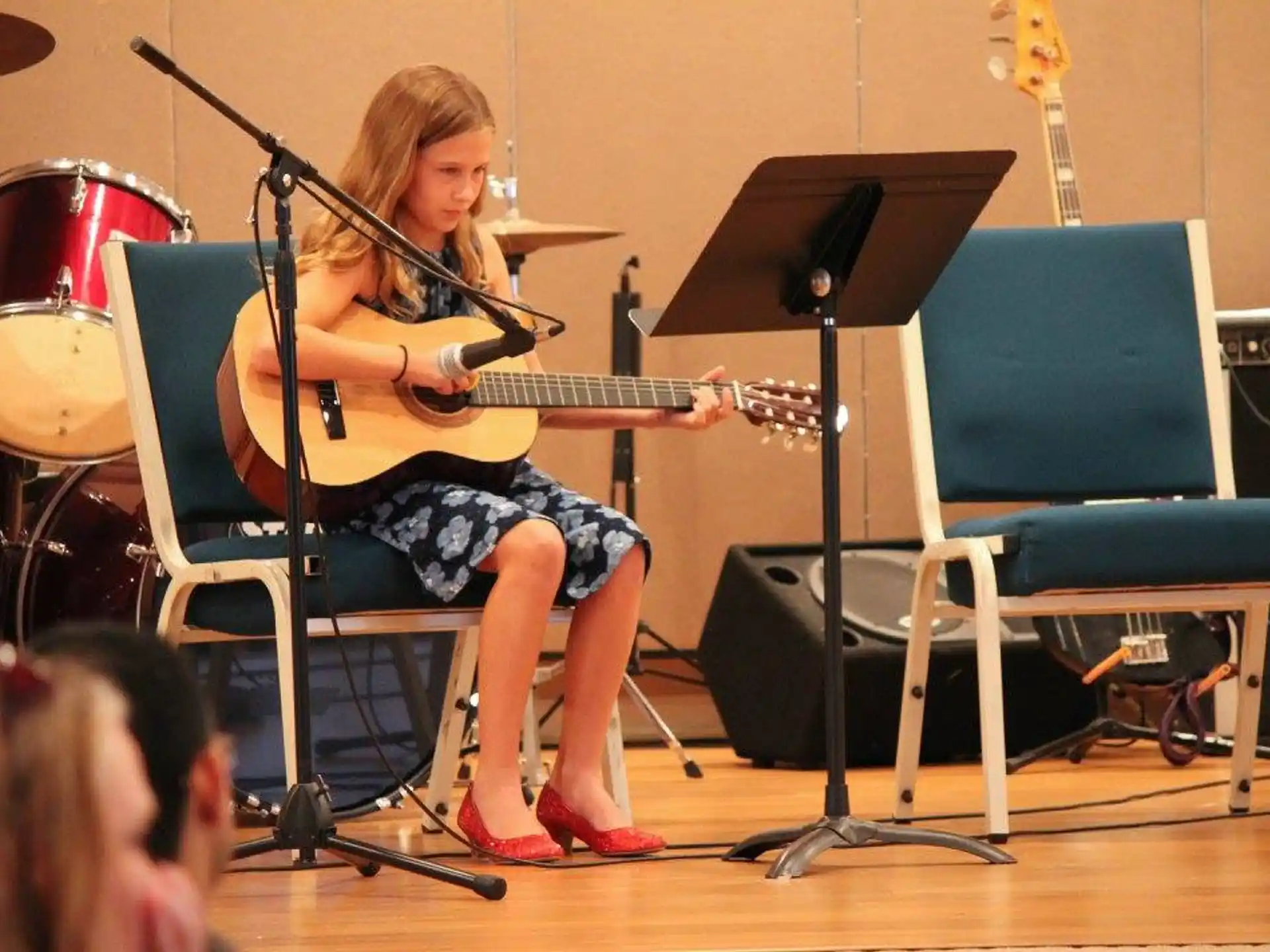 a person playing a guitar