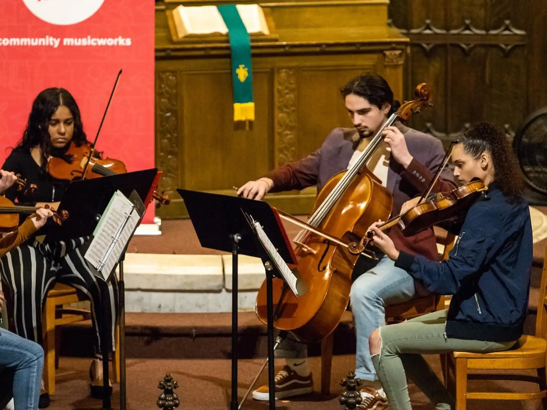 a group of people playing instruments
