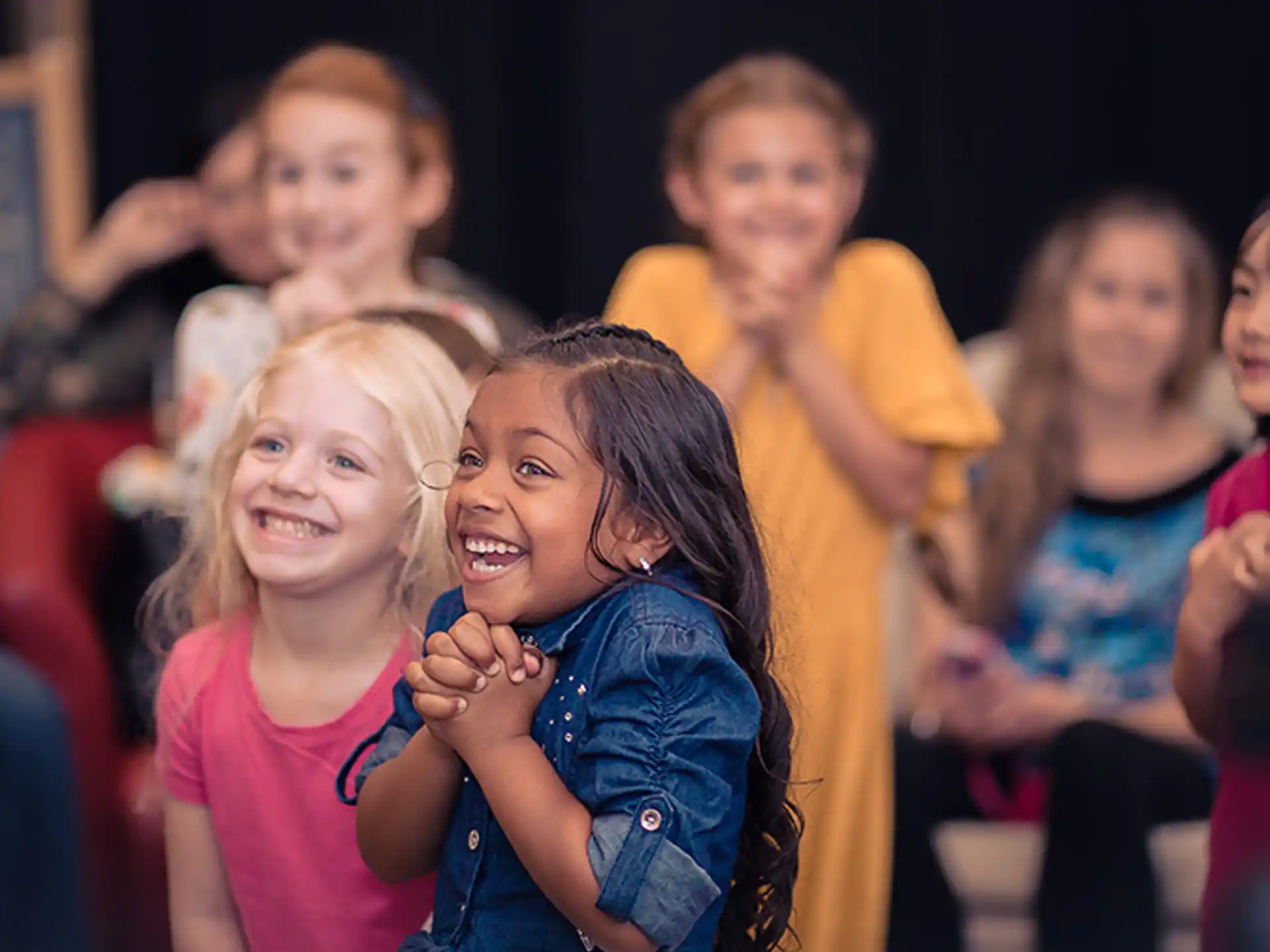 a group of children smiling