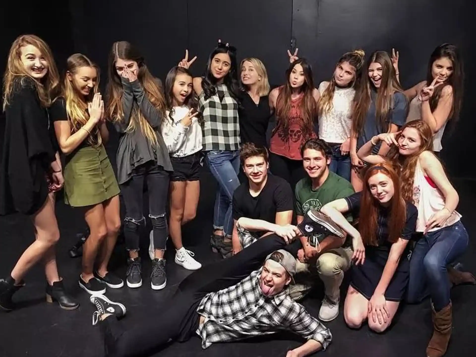 a group of people posing for a photo