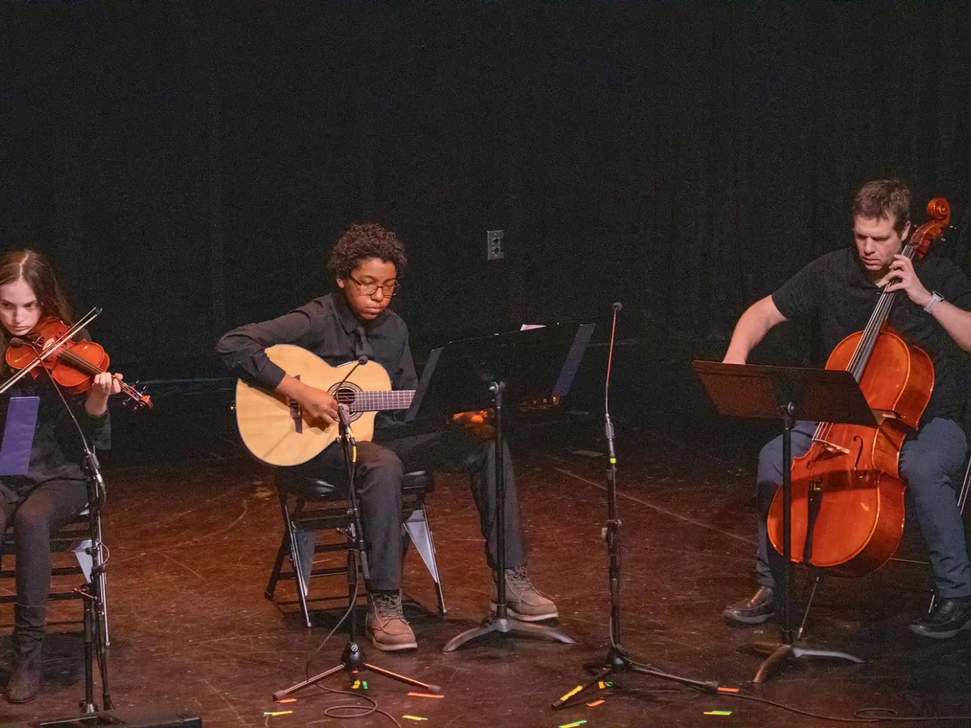 a group of people playing instruments