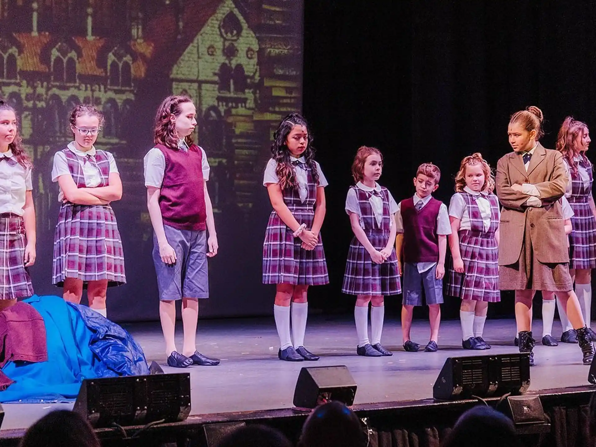 a group of children on a stage