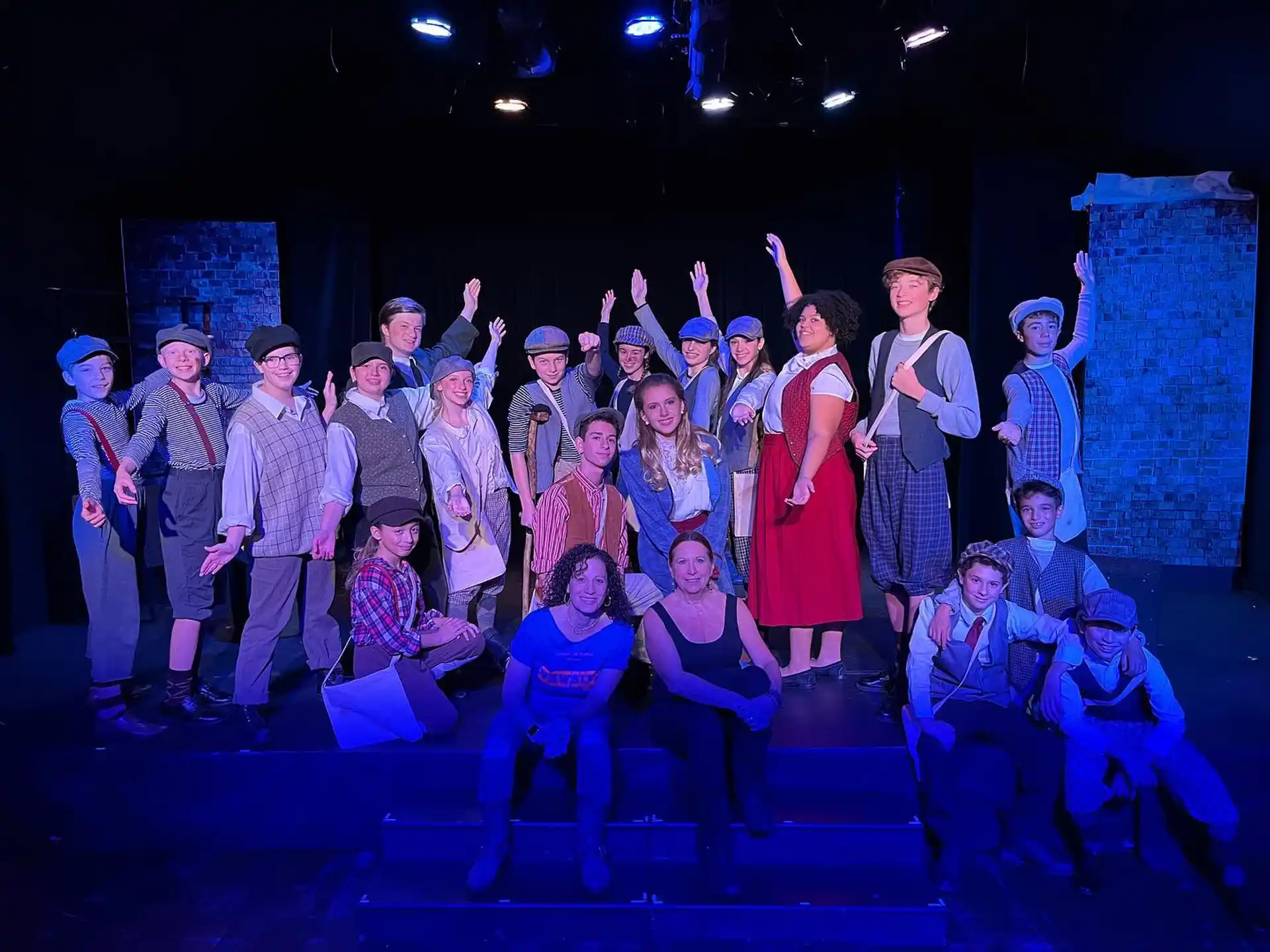 a group of people on a stage
