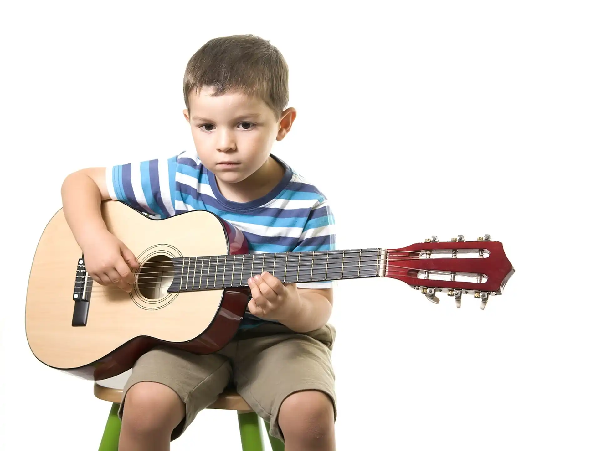 a boy playing a guitar