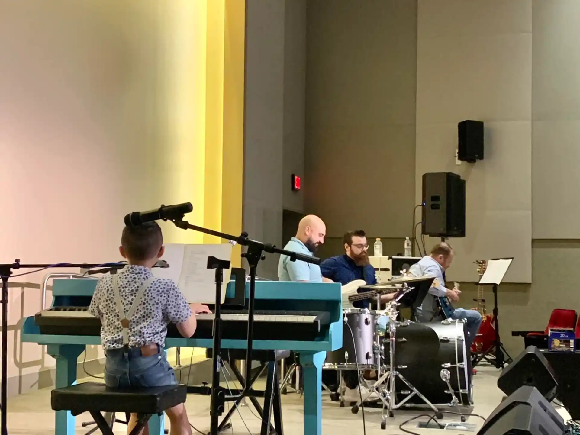 a group of people playing instruments