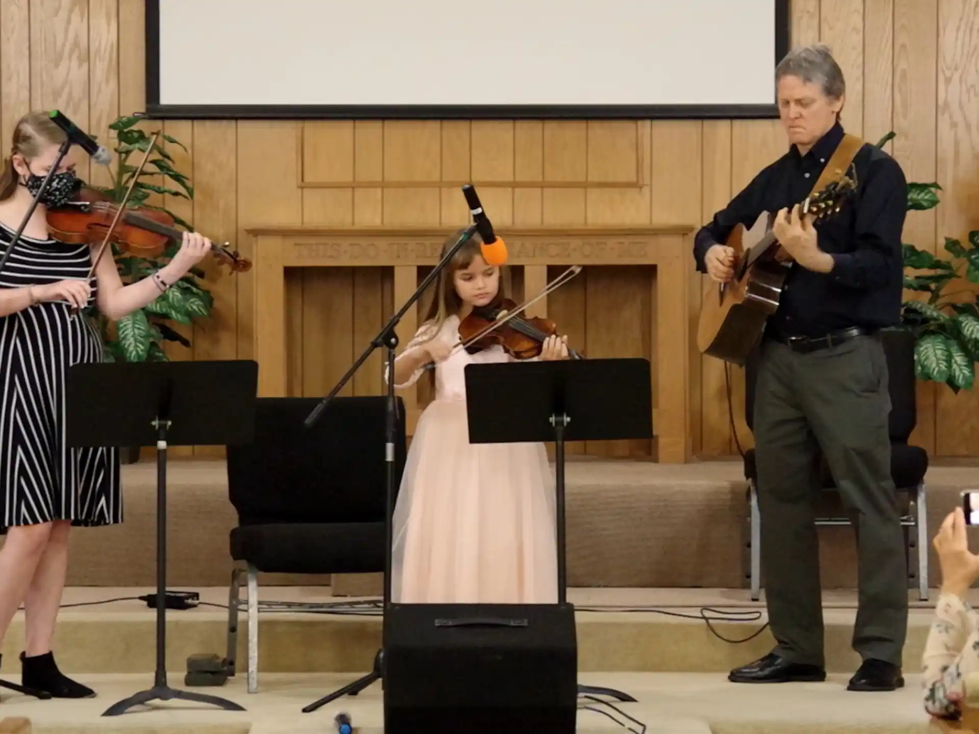 a group of people playing instruments