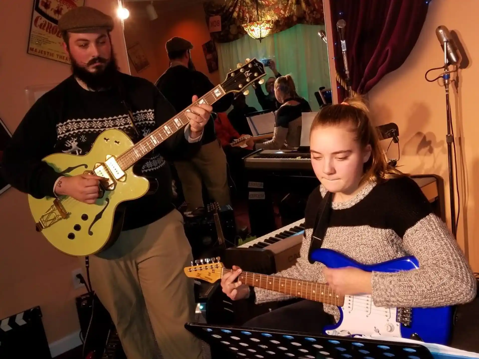 a man and a woman playing instruments