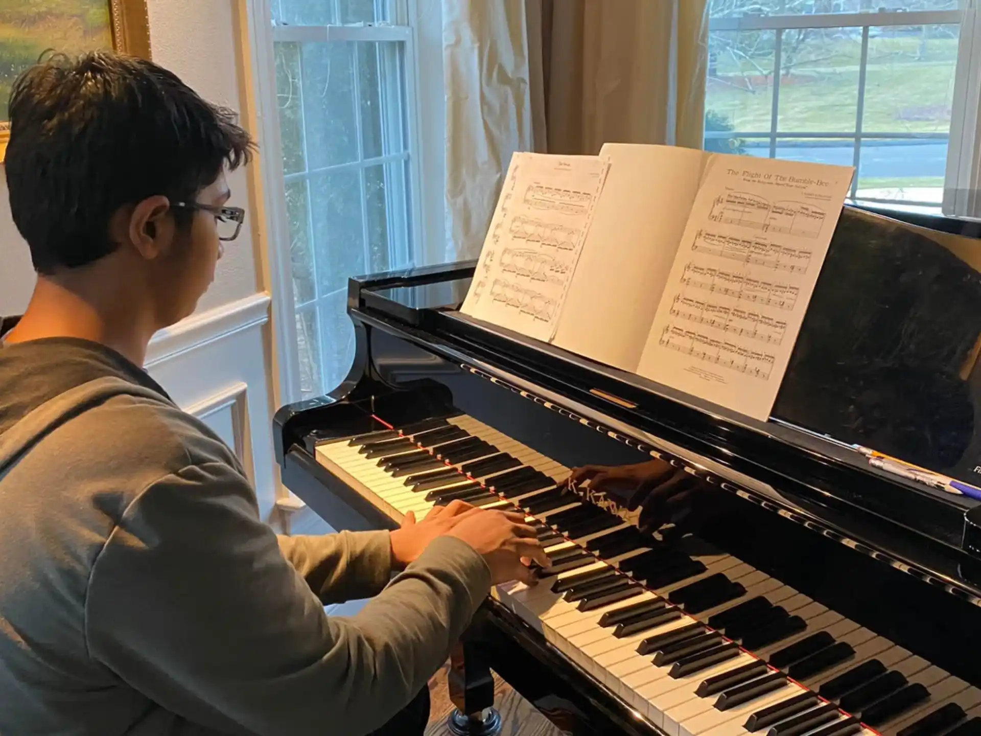 a person playing a piano