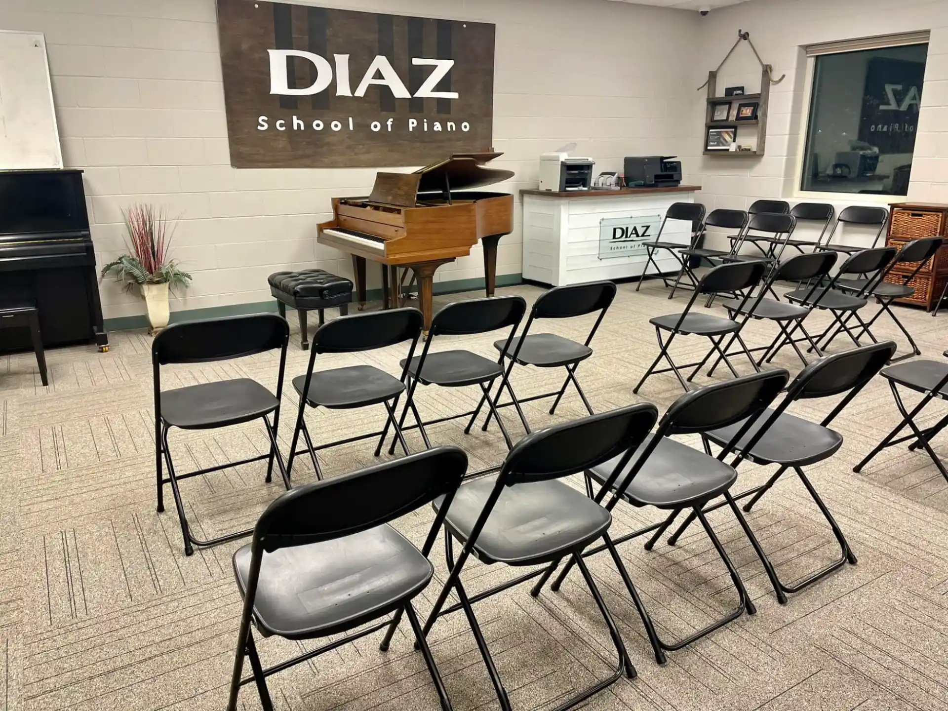 a room with chairs and tables