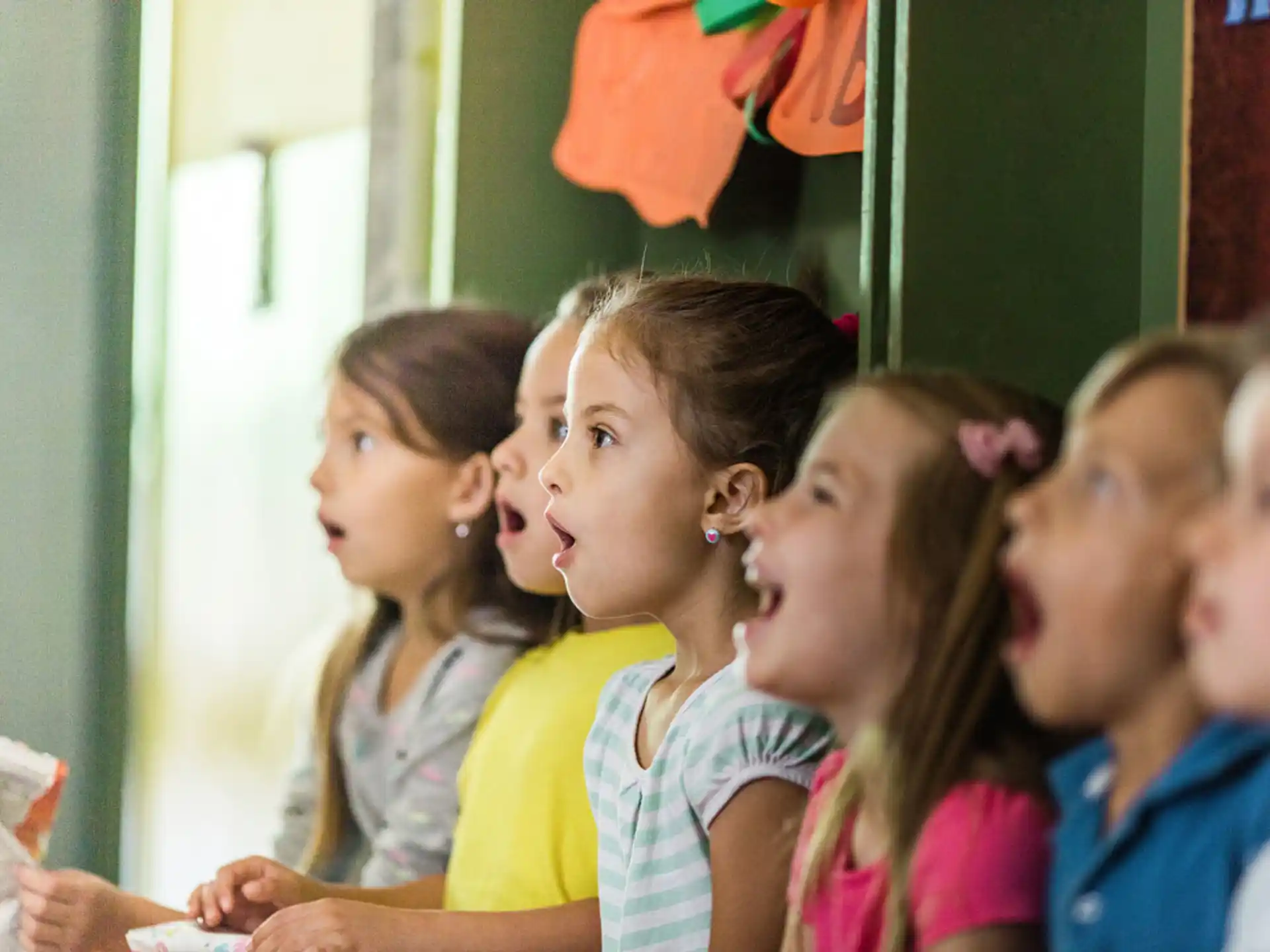 a group of children in a classroom