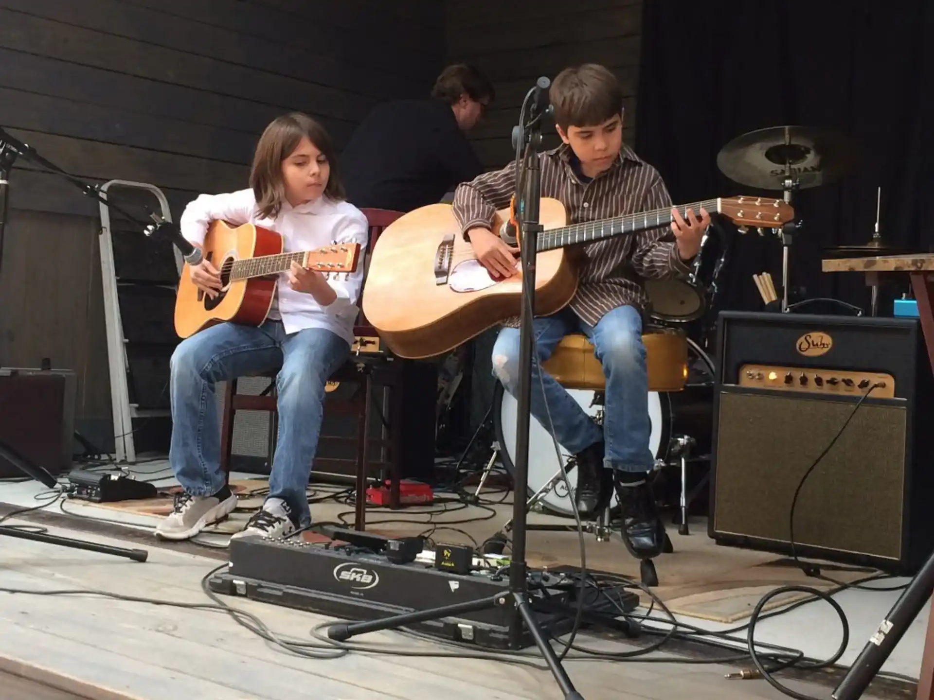 a group of people playing instruments
