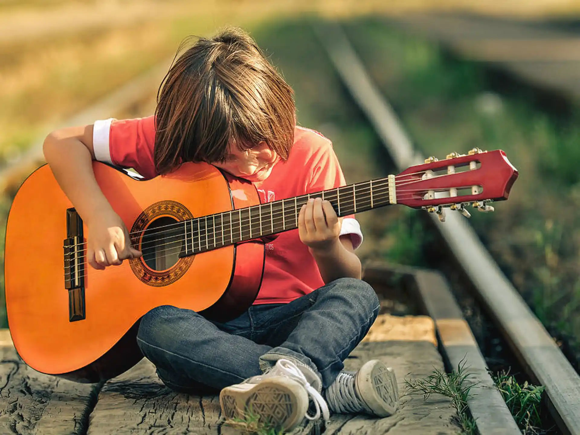 a person playing a guitar