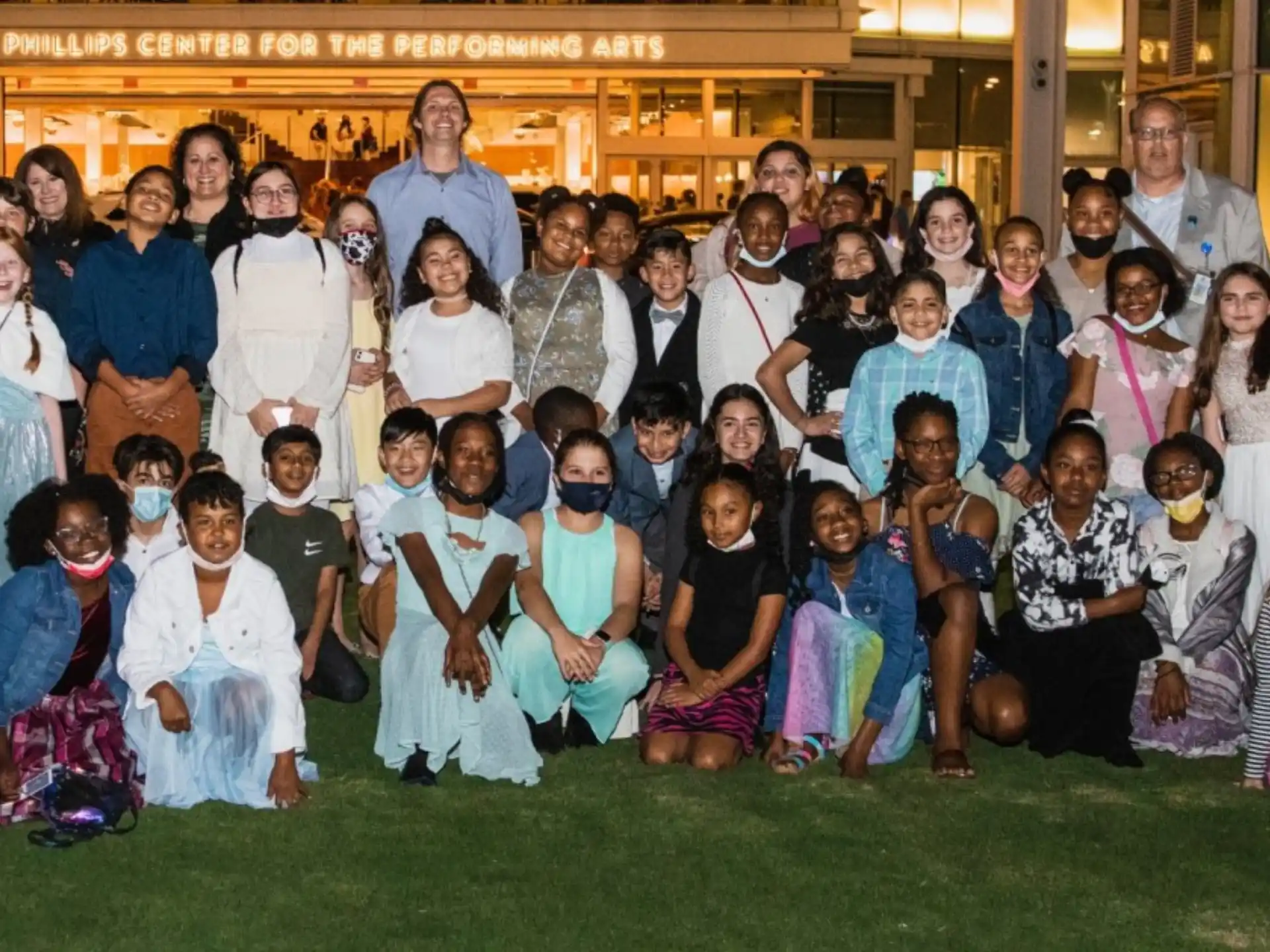 a group of people posing for a photo