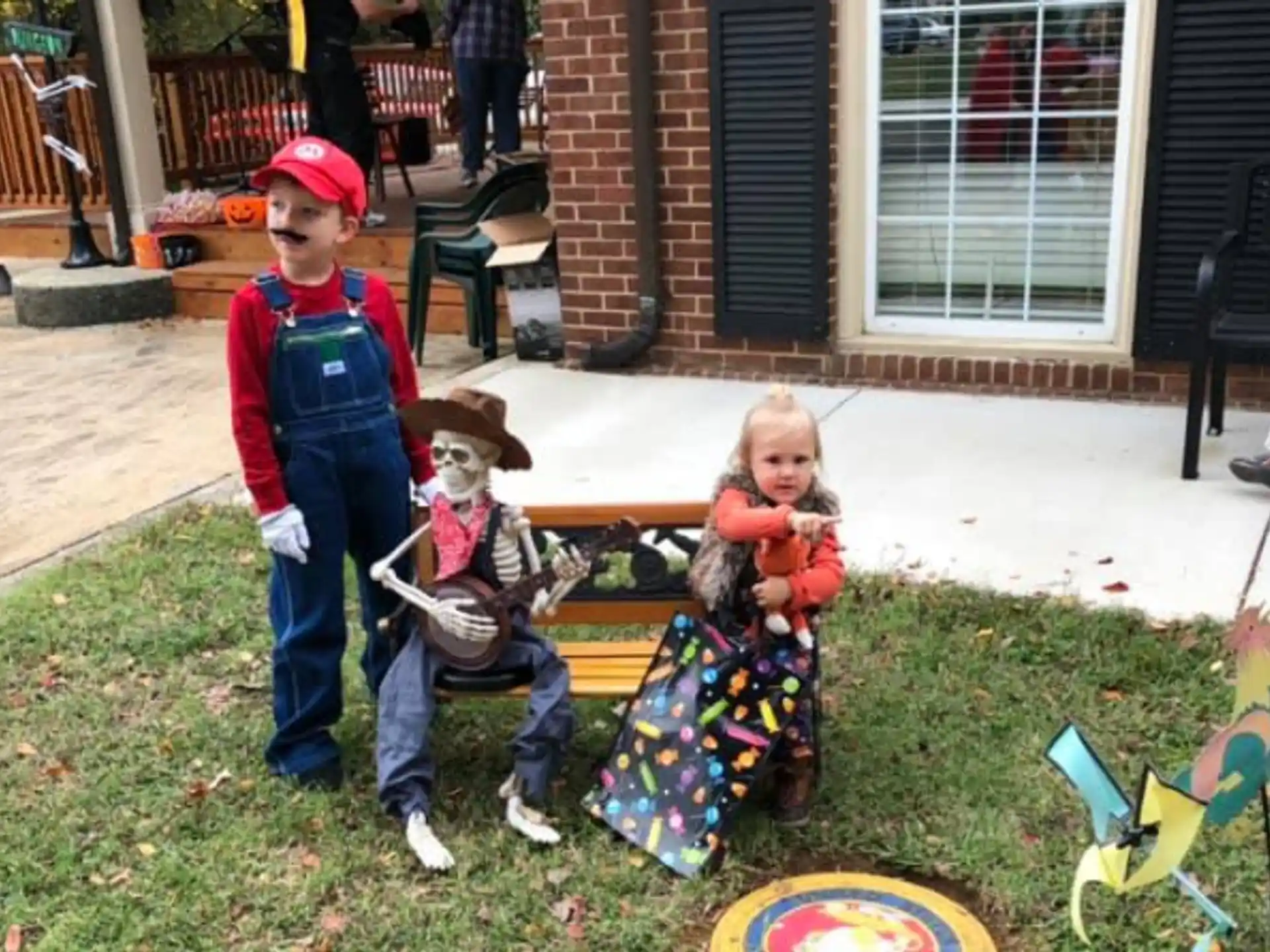 a group of children playing in a yard