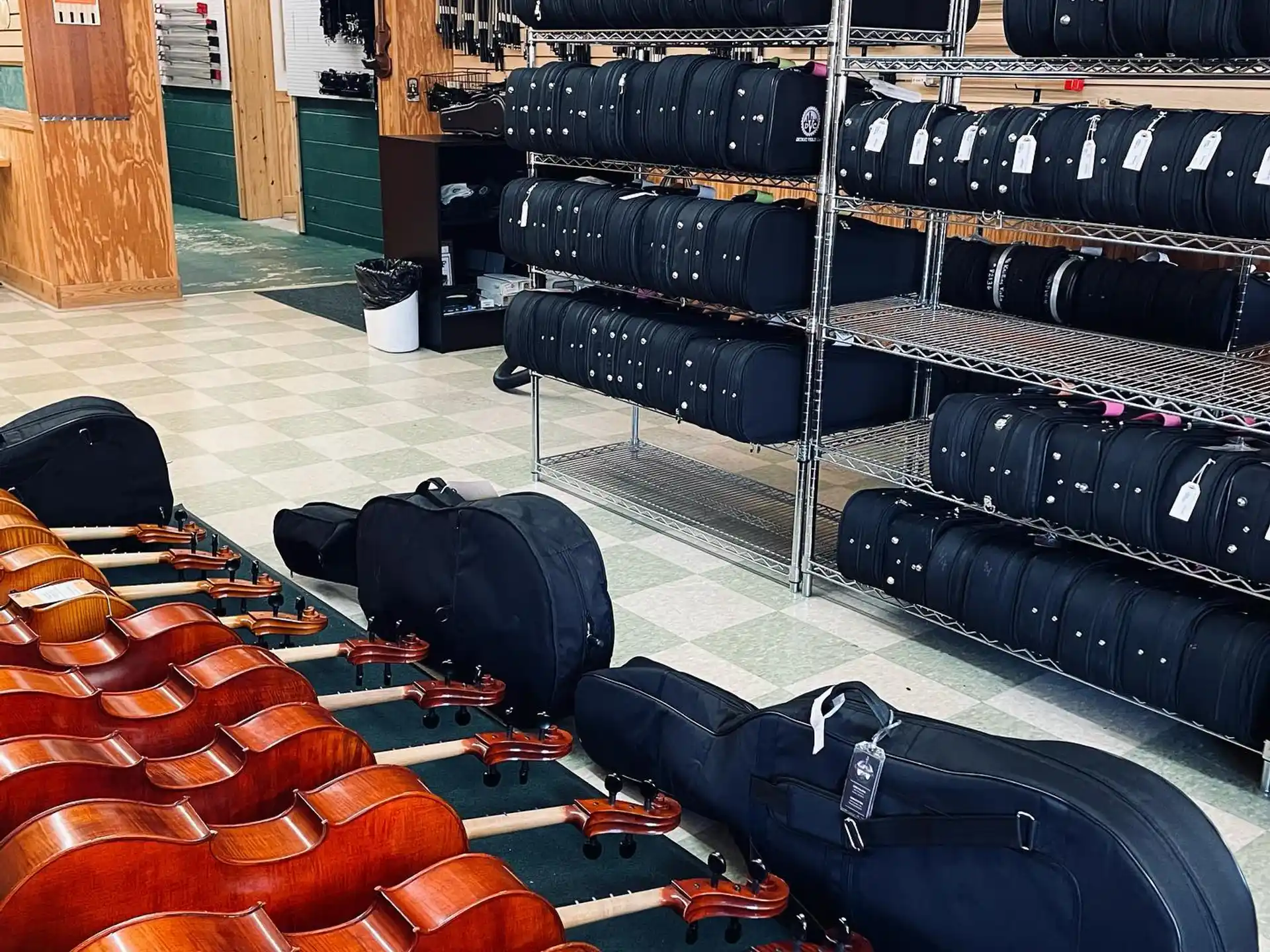 a room full of black and red chairs