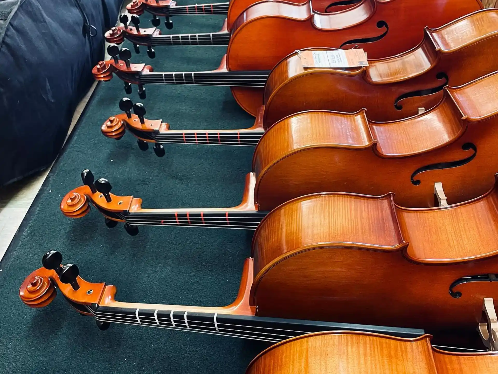 a row of brown and orange musical instruments