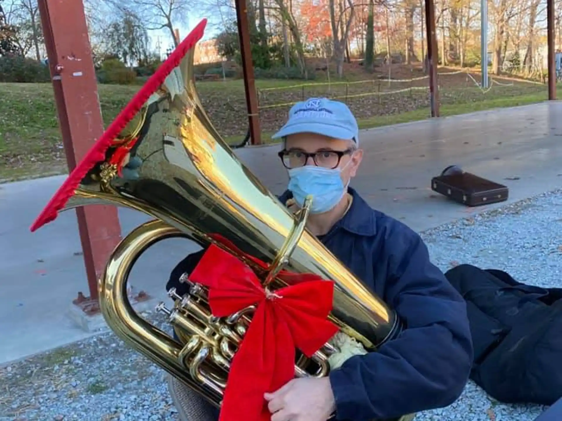 a person holding a large instrument
