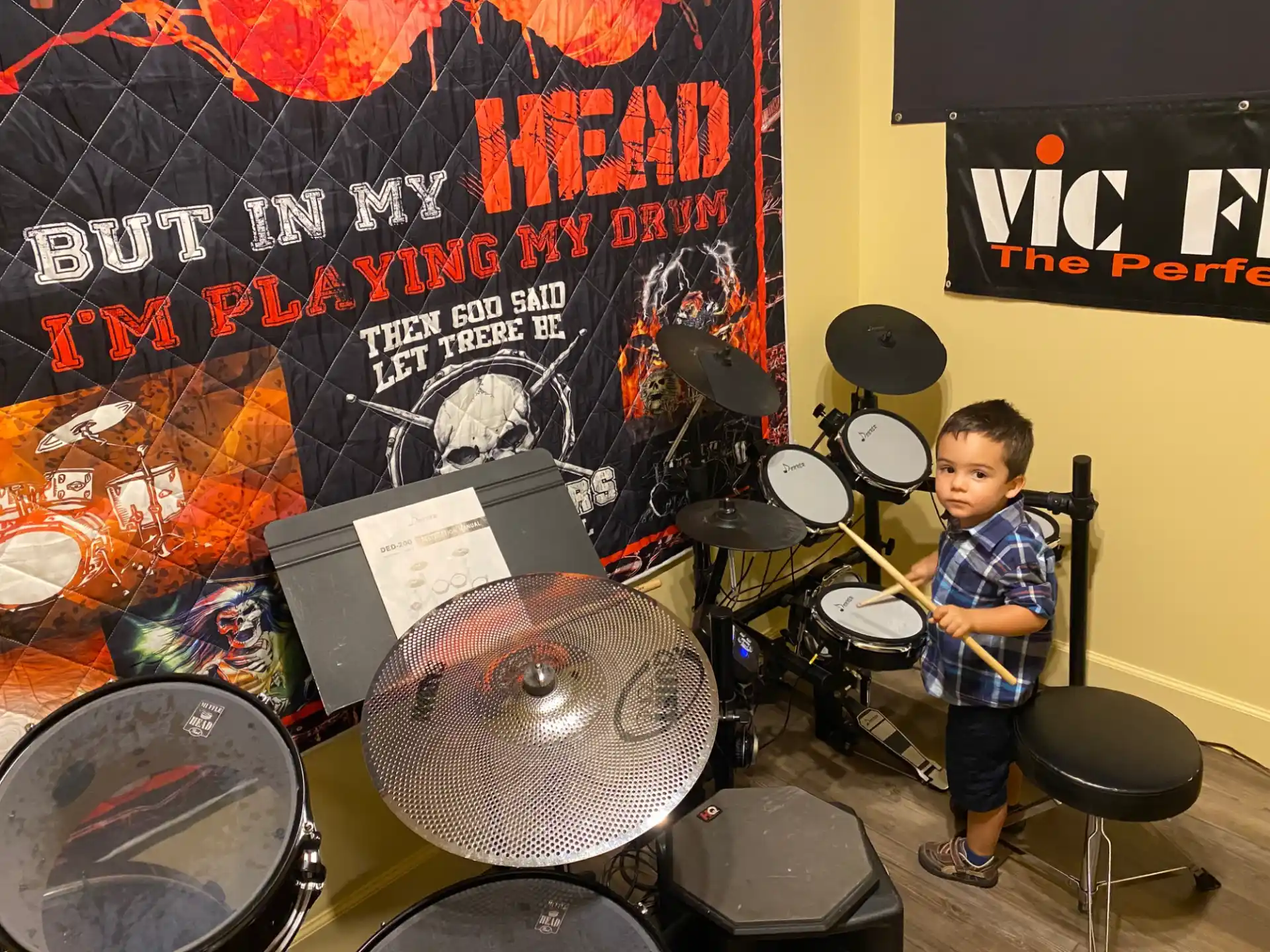 a boy playing drums