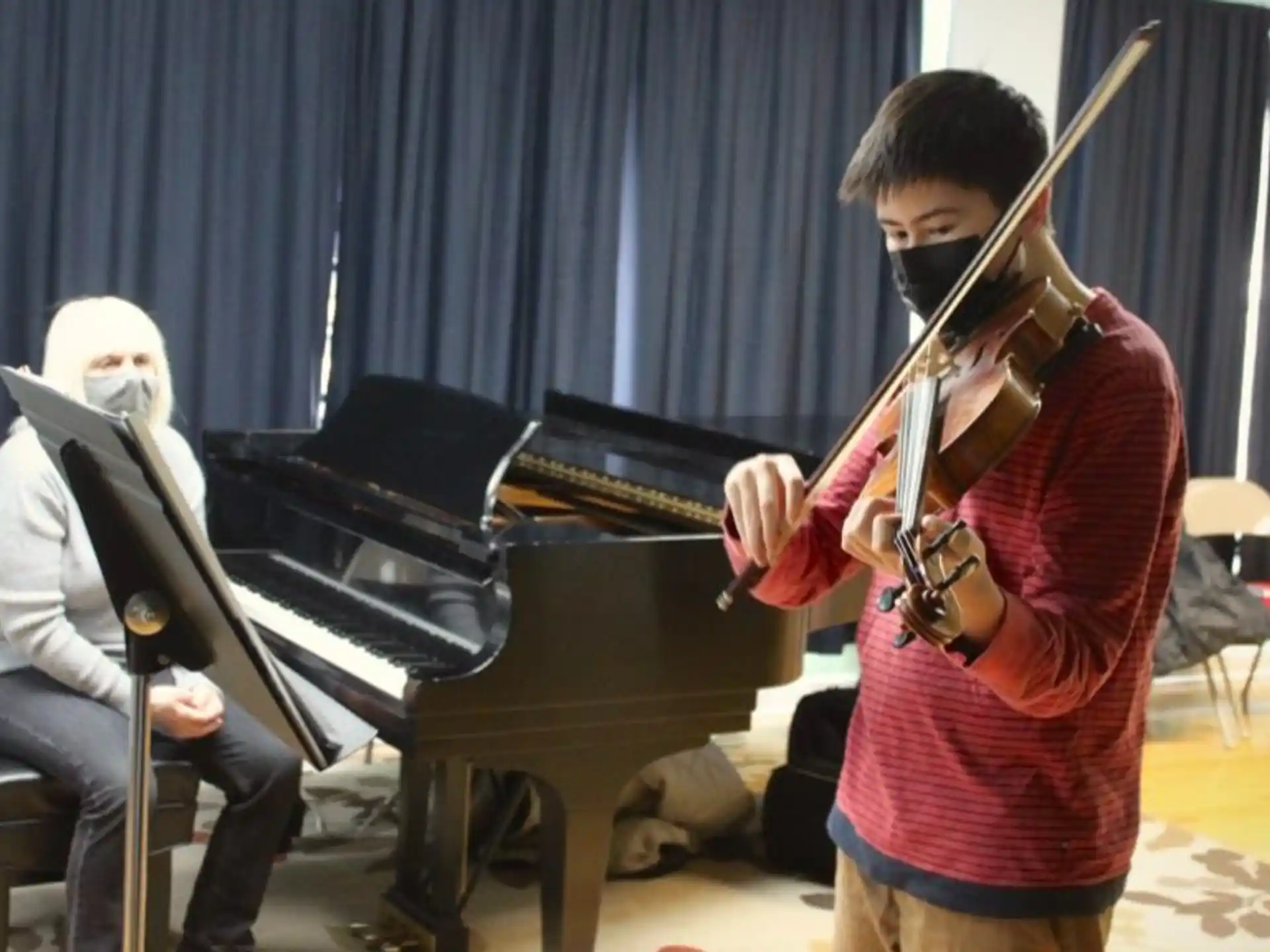 a person playing a violin