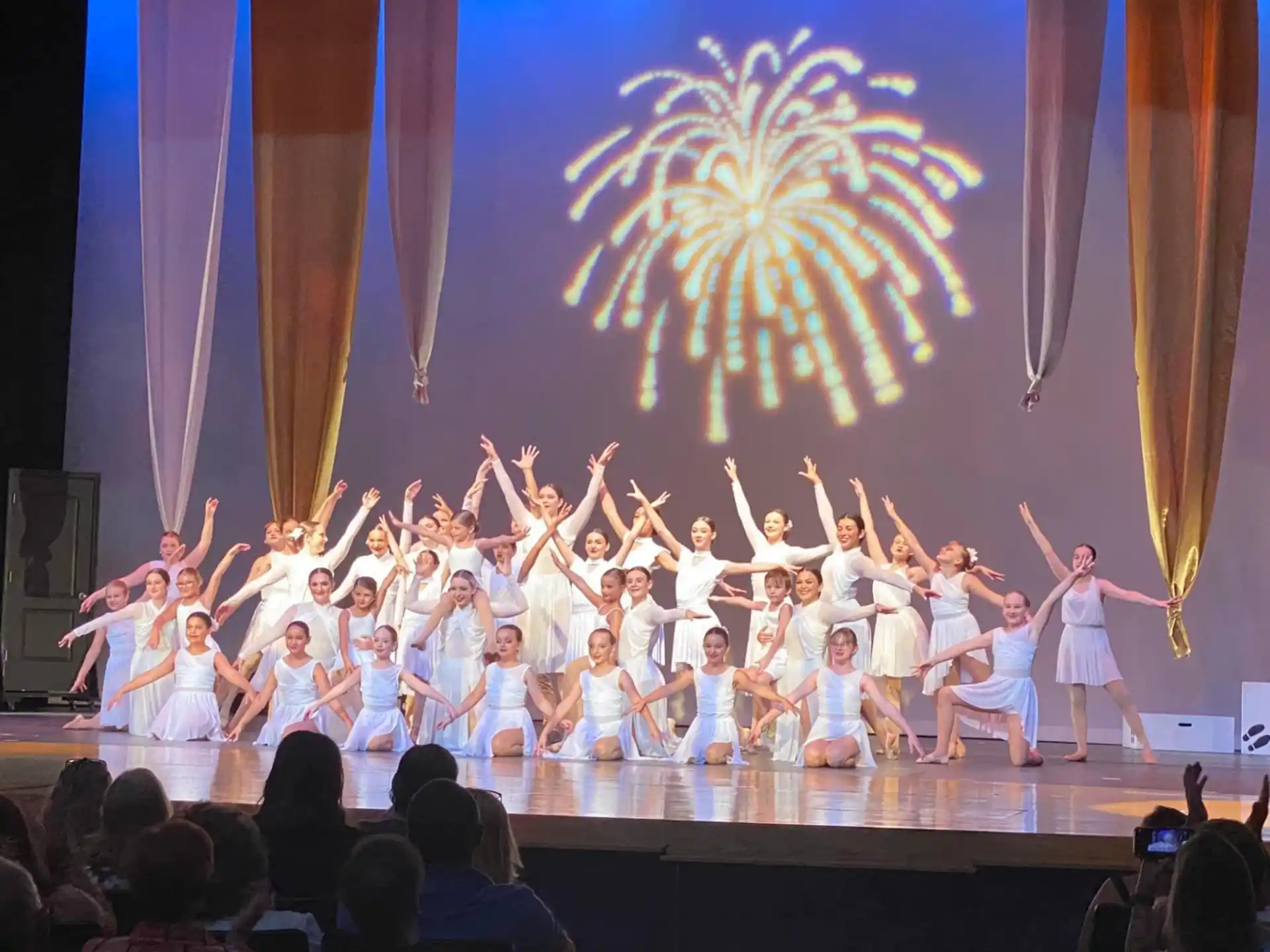 a group of people on a stage
