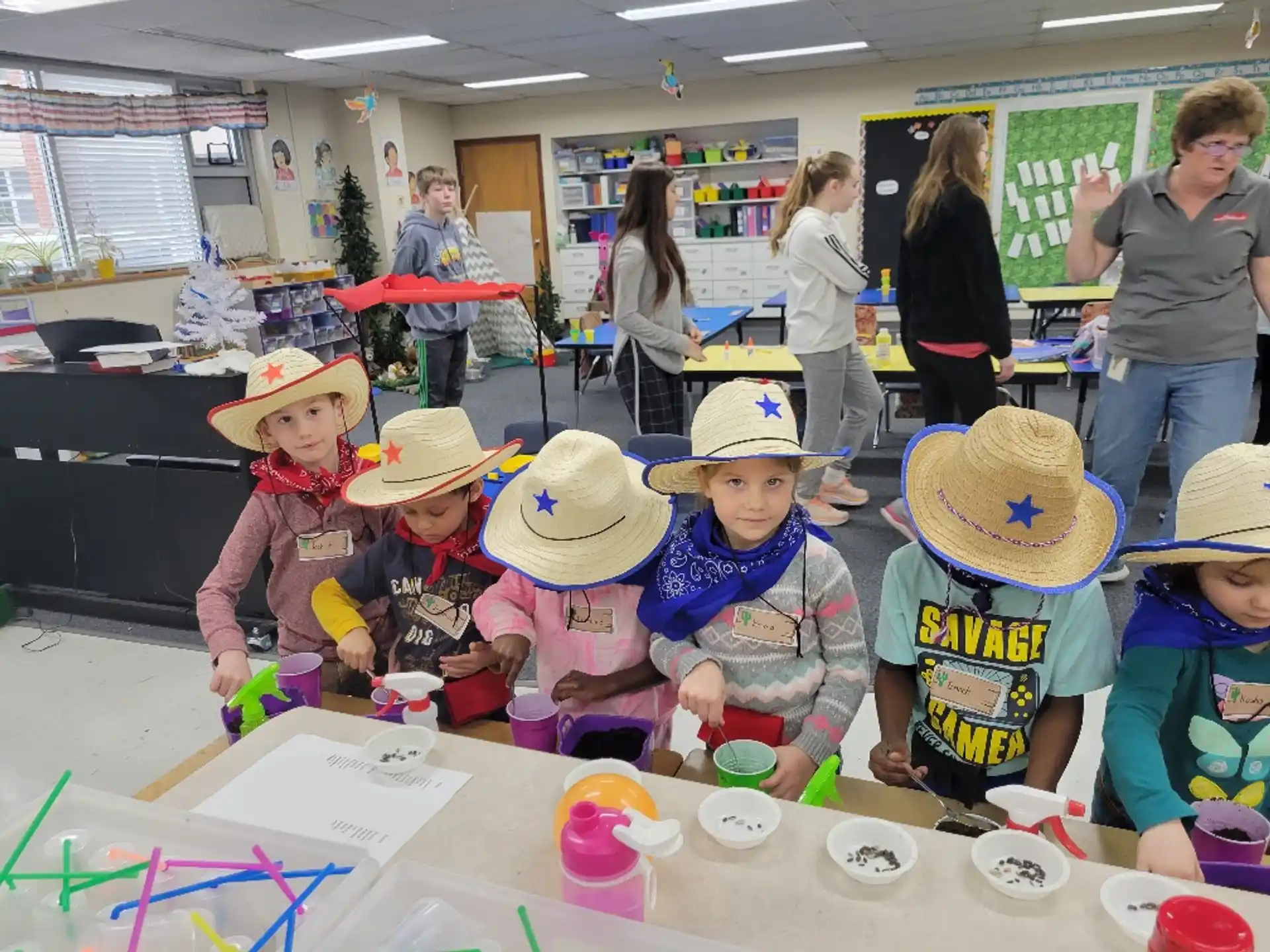 a group of children wearing hats