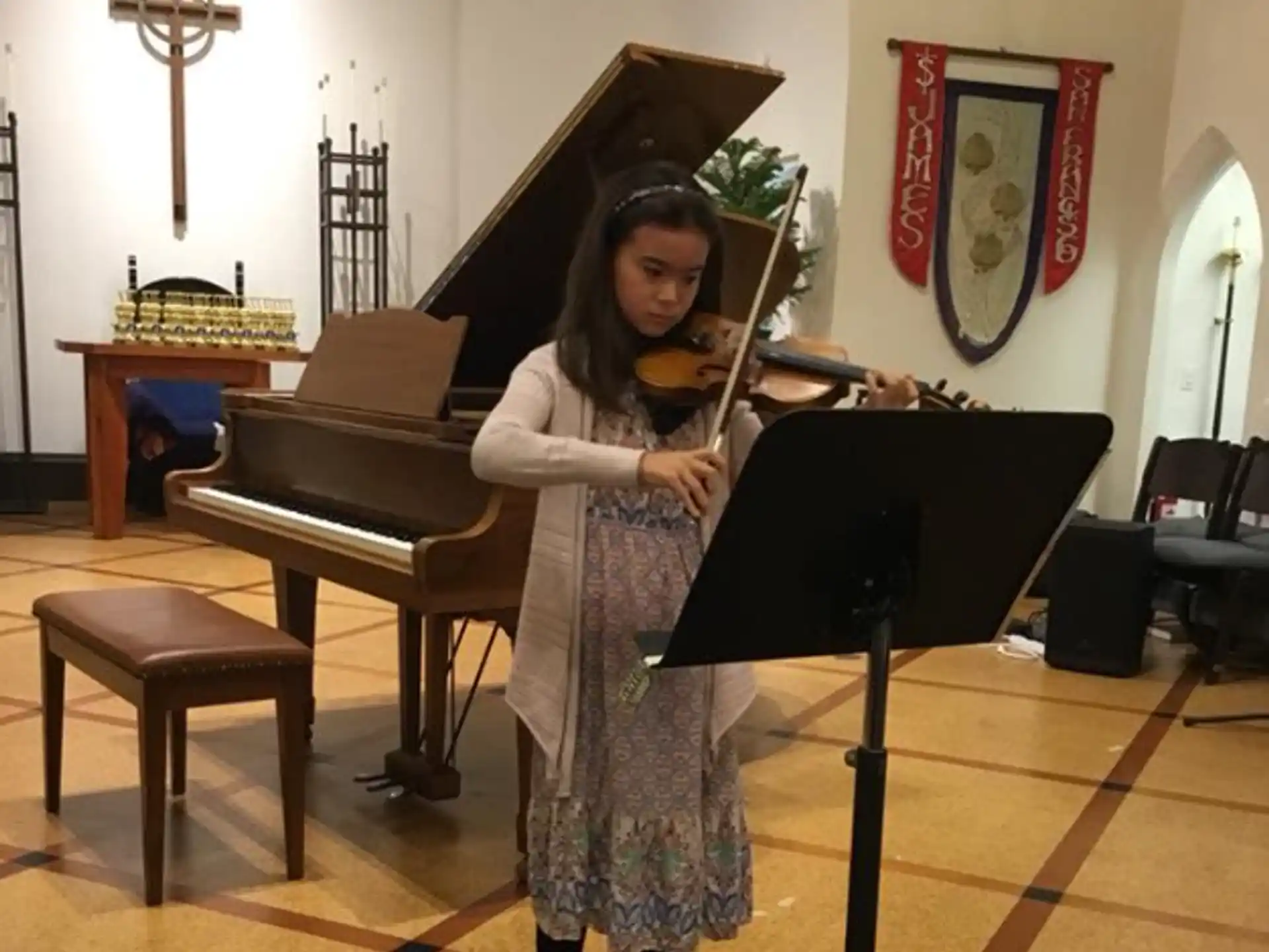 a person holding a musical instrument