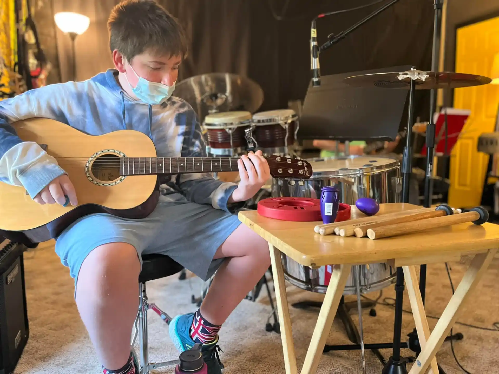 a person playing a guitar