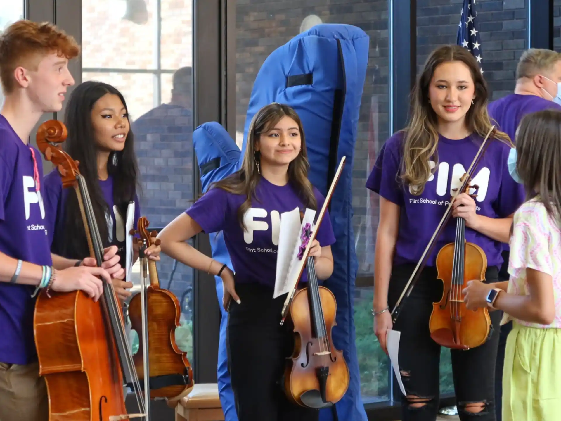 a group of people playing instruments