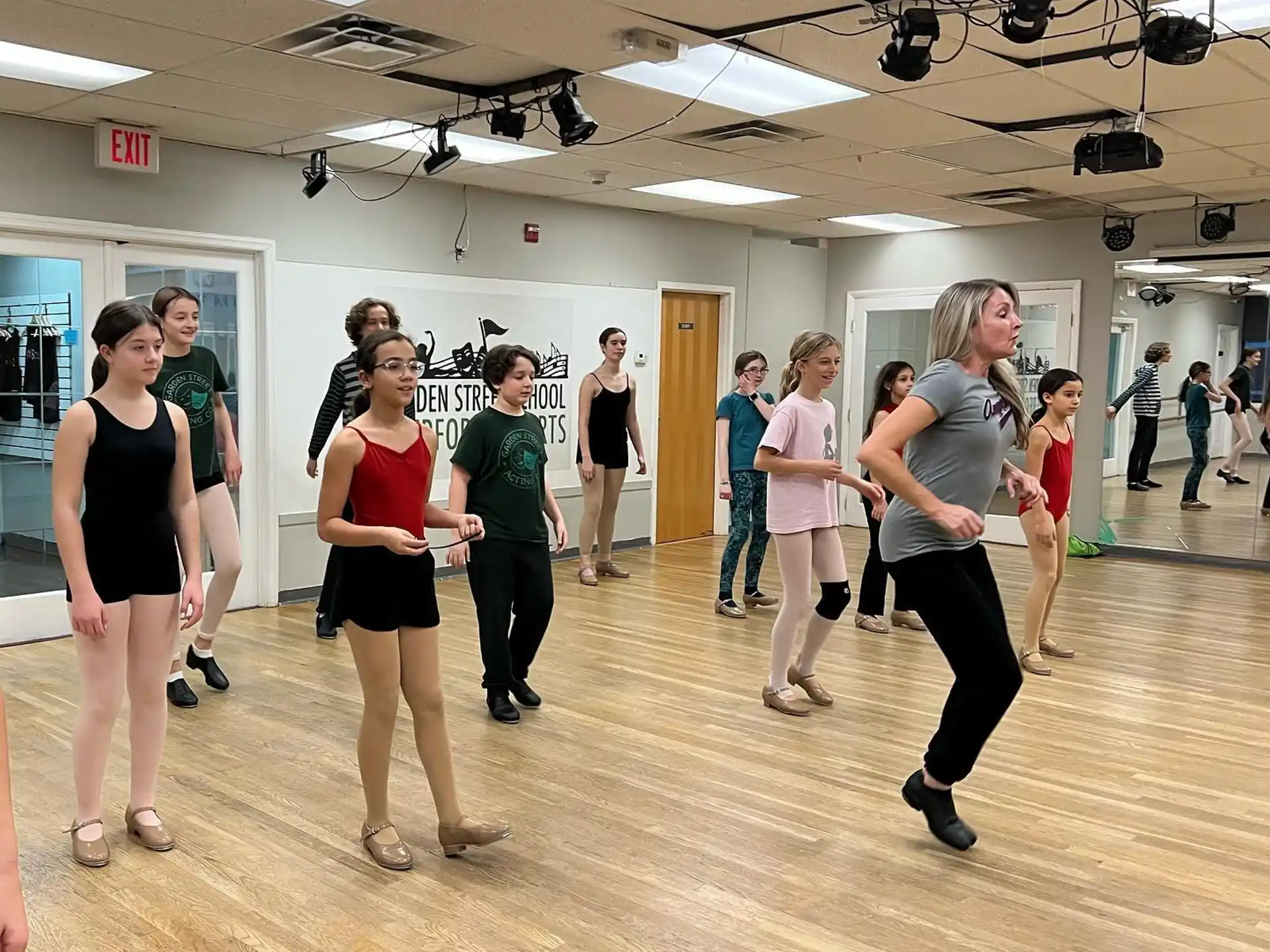 a group of people dancing in a room