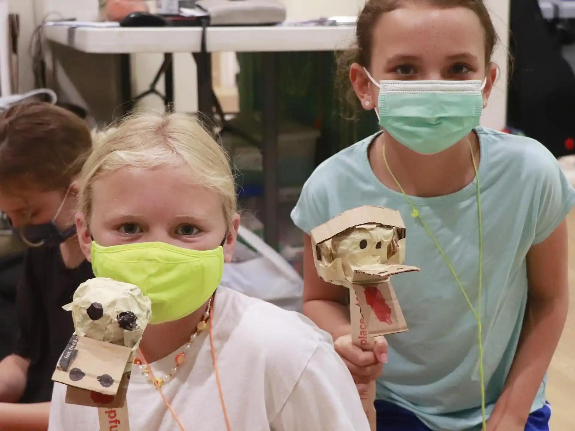 a group of children wearing masks