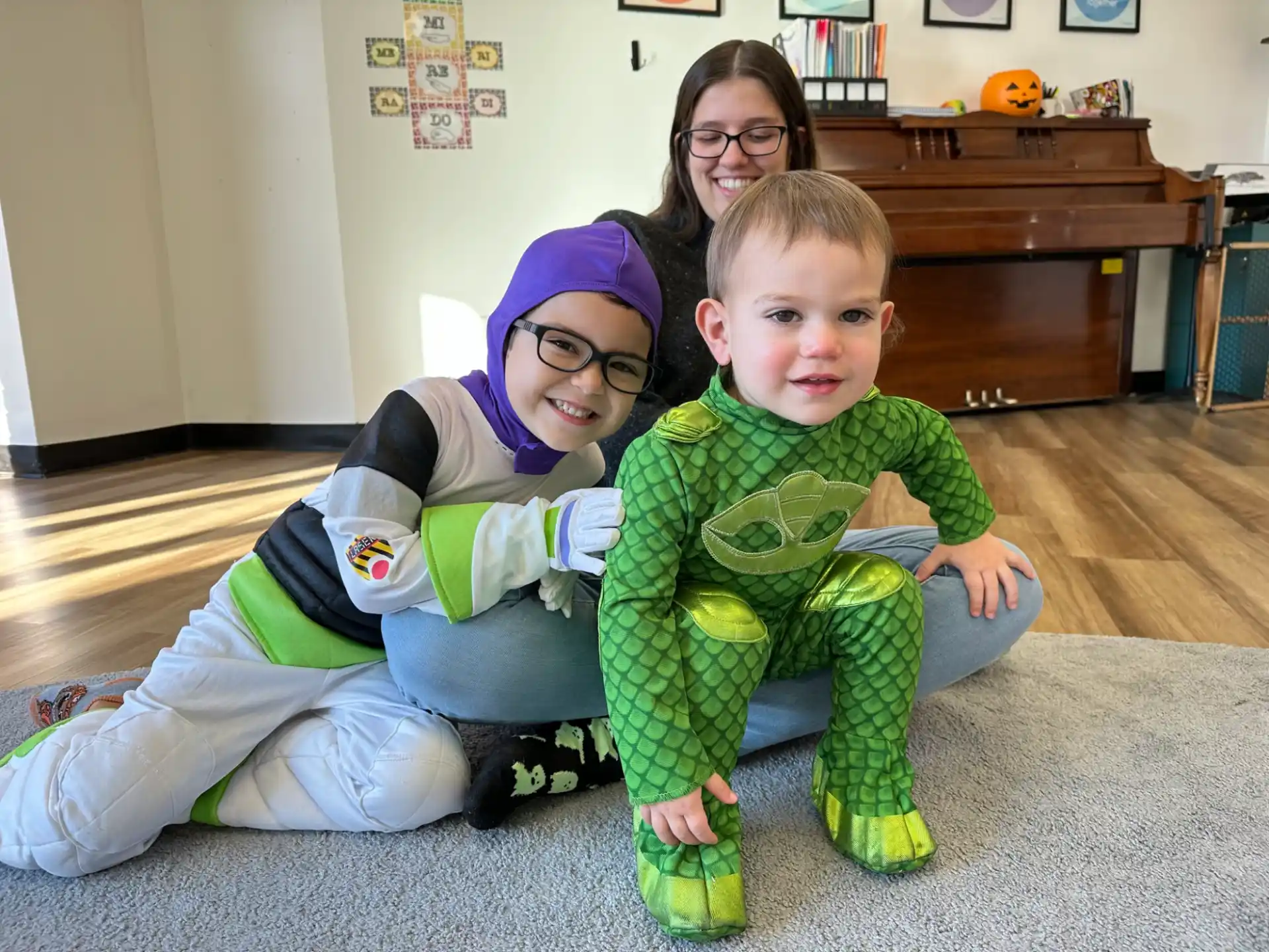 a group of children sitting on the floor