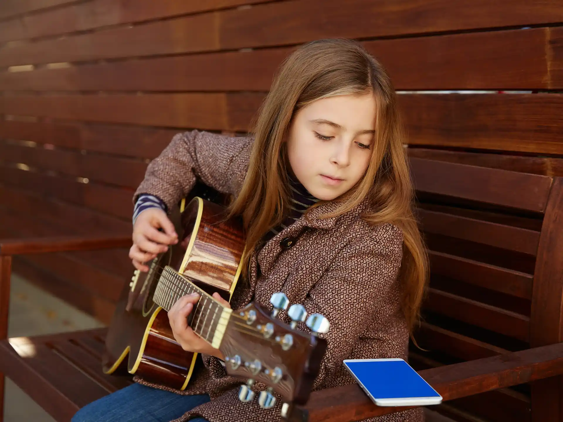 a person playing a guitar