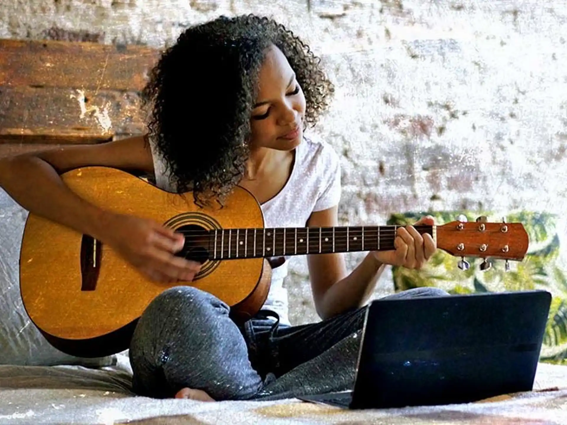 a person playing a guitar