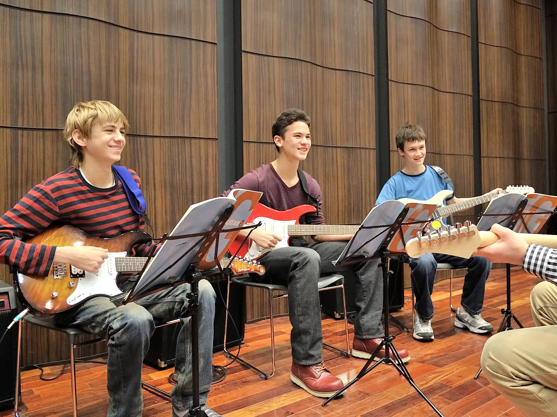 a group of people playing instruments